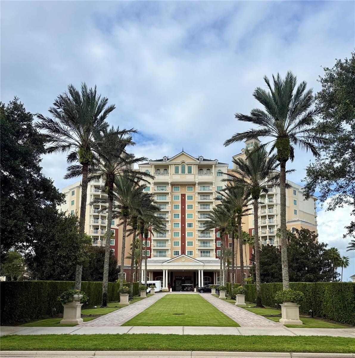 Under contract-accepting backup offers. Welcome to Reunion Grande Unit 509, where timeless elegance meets the excitement of resort living in one of Central Florida’s most desired destinations. This beautifully designed 2-bedroom, 2-bathroom condo is located on the 5th floor of the Reunion Grande, offering stunning views that capture the beauty of the golf course by day and the spectacular Disney fireworks by night.
Step inside and experience the spacious open floor plan, where the living and dining areas flow effortlessly into the gourmet kitchen. Outfitted with granite countertops, stainless steel appliances, and a generous breakfast bar, the kitchen is as functional as it is stylish—perfect for entertaining or enjoying quiet mornings at home. The adjoining living space includes a wet bar, adding an extra touch of convenience and sophistication.
Both bedrooms are thoughtfully designed retreats. The master suite boasts his-and-hers closets, a private balcony, and a spa-inspired bathroom with dual vanities, a soaking tub, and a walk-in shower. The second bedroom is equally inviting, featuring its own private balcony, ample closet space, and an en-suite bath with dual sinks, a tub, and a walk-in shower. With its wide windows and sliding doors, natural light floods the condo, creating a bright and welcoming atmosphere throughout.
Reunion Grande itself is a flagship building, offering the lifestyle of a luxury hotel with the comforts of home. From the valet service and grand lobby to the rooftop pool and restaurant with panoramic views, every detail has been designed to impress. As an owner, you’ll enjoy access to three signature golf courses by Palmer, Watson, and Nicklaus, a multi-million-dollar water park with lazy river and slides, six tennis courts, a full-service spa, multiple dining options, and miles of beautifully landscaped grounds. All of this is just six miles from Walt Disney World and minutes to Orlando’s world-class attractions, shopping, and entertainment.
Whether you are searching for a primary residence, a second home, or a high-performing short-term rental, Unit 509 offers the perfect blend of luxury, convenience, and investment opportunity. Fully furnished and meticulously maintained, it is move-in ready and waiting for its next owner.
Don’t miss your chance to own one of the most desirable floor plans in the Reunion Grande. Schedule your private showing today and discover why this condo is more than a home—it’s a lifestyle.