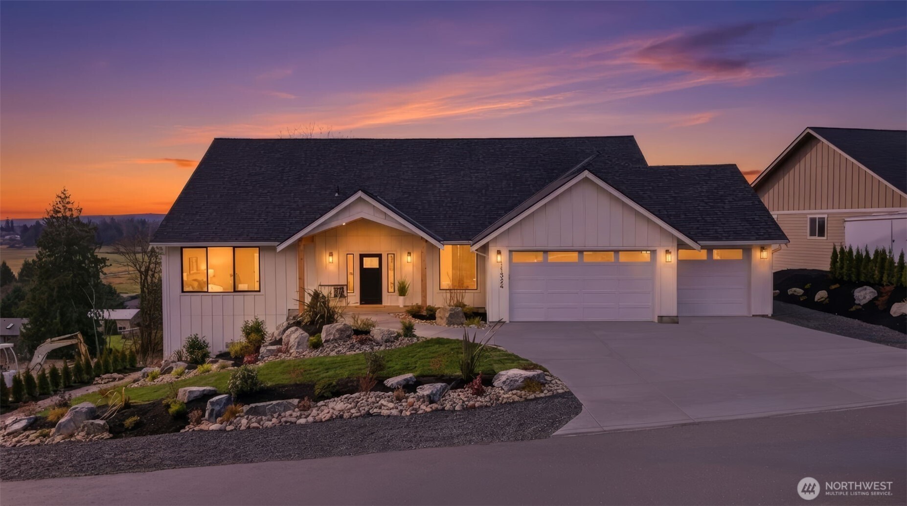 Enjoy comfortable luxury with stunning views in this thoughtfully built new estate, set on 1.4 private acres in a gated community. The main level features a no-step entry with 4 bedrooms and 2.75 bathrooms, including a spacious primary suite with a walk-in closet and a luxurious 5-piece bath. Vaulted ceilings and an open-concept layout create a bright, inviting space ideal for everyday living and entertaining. The kitchen features stainless steel appliances, a butler’s pantry/coffee station, and a wine cooler. The lower level includes a finished flex or exercise room, plus an unfinished 1,899 sq ft basement with a separate entrance, roughed-in for multi-generational living, recreation, or potential ADU space. Take in sunset views from the expansive deck overlooking the large backyard. Additional highlights include a private well with dual connections and a 3-car garage. Conveniently located near local amenities, shopping, and commuter routes, while offering a peaceful, private setting.