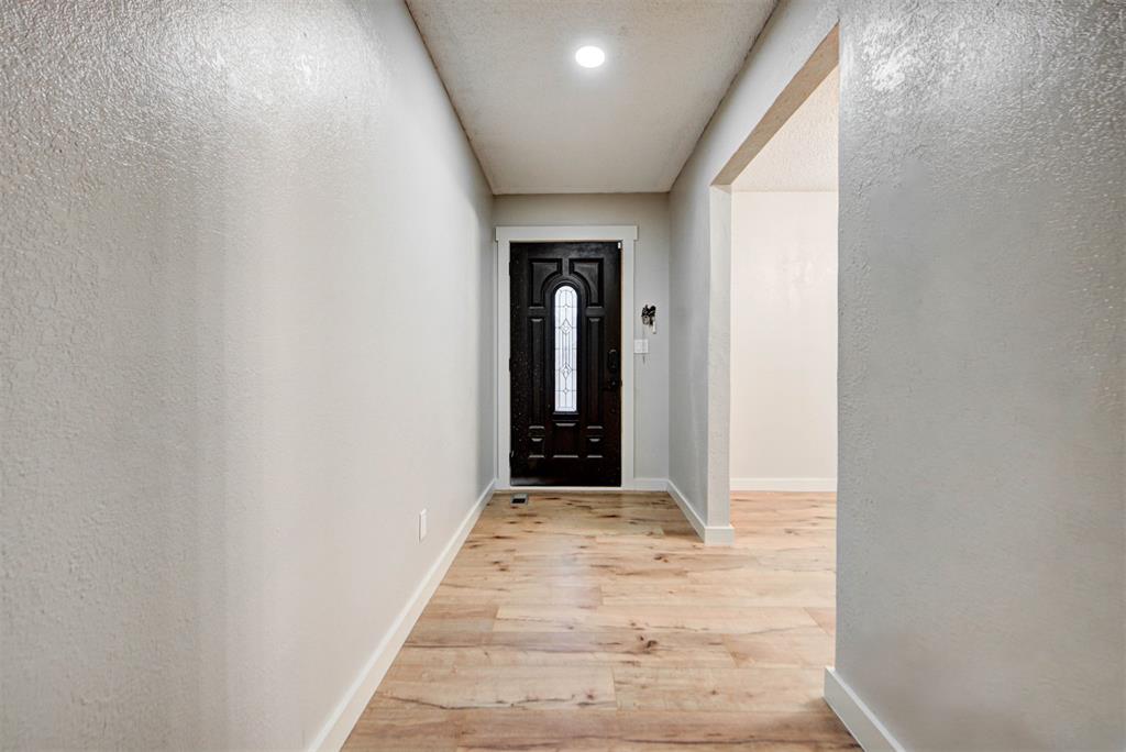 Recently remodeled 3-bedroom, 2-bath home in Moore, OK, offering just under 1,500 sq ft with a two-car garage. Conveniently located minutes from local shopping, hospitals, and entertainment. This home features new LVP flooring throughout, freshly painted cabinets, updated fixtures, and stainless steel appliances. Enjoy a spacious back patio perfect for beautiful evenings and entertaining.