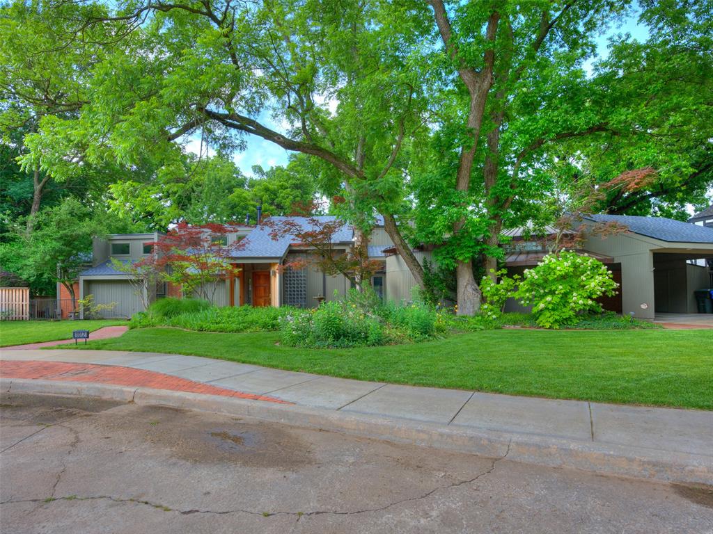 Welcome to 1012 Nottingham Circle — a rare architectural treasure where mid-century modern design meets today’s luxury living. Close to campus!Originally owned by architect Ben Graves, this home is filled with timeless character: soaring ceilings, floor-to-ceiling windows, and a design that connects indoor and outdoor spaces. Over the past two years, the home has been transformed through a complete renovation — blending modern functionality with its architectural roots.Inside, you’ll find 4,204 sq ft (per appraisal) of beautifully reimagined living space. The heart of the home is a stunning chef’s kitchen, featuring custom walnut cabinetry, a dramatic quartz island, gas range, and walk-in pantry with a built-in coffee bar. Just off the kitchen, a sunlit garden room with its own climate control offers the perfect spot for morning coffee, a yoga practice, or simply enjoying the view year-round.The layout is designed for flexibility:• A sprawling 730 sq ft loft for a home office (or two), second living area, or creative studio.• A renovated master suite with spa-like finishes.• An additional ADA-compliant bathroom, thoughtfully designed for multi-generational living or guests.Step outside to a show-stopping yard with professional landscaping, Japanese maples, perennials, and mature trees. No detail has been overlooked — from new hardwood floors, new roof, and upgraded electrical, to a brand-new sewer line, hot water heater, sprinkler system, and LED lighting throughout. This is truly a turnkey architectural gem: a rare opportunity to own a custom mid-century home that’s been carefully restored and modernized for today’s lifestyle.
