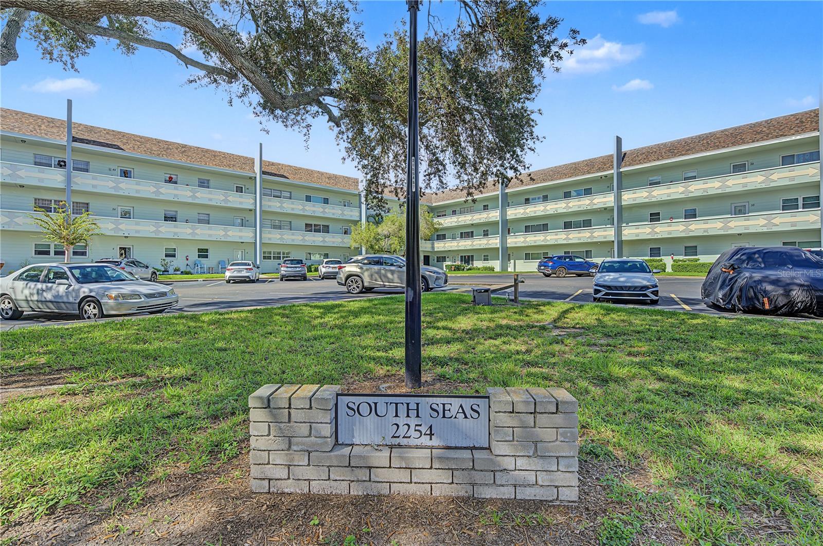Enjoy the Florida lifestyle in this beautifully updated condo in Clearwater’s On Top of the World 55+ community! The kitchen, remodeled in 2021, features an open layout, new cabinetry, leather-finish granite countertops, an industrial-style sink, garbage disposal, and upgraded electrical wiring and panel. Stainless steel appliances from 2021 include a French-door refrigerator, range, microwave, and dishwasher. A permitted stackable washer and ventless dryer in the kitchen provide everyday convenience. No carpet! Laminate flooring extends throughout the living areas and bedrooms, complemented by vinyl tile flooring in the kitchen.Both bathrooms have been updated with step-in showers, new vanities, toilets, flooring, and lighting. Dimmable recessed lighting in the living room creates a welcoming atmosphere, while custom blackout blinds installed in both bedrooms in 2023 offer comfort and privacy. Additional improvements include hurricane-impact windows installed in 2020 with a transferable lifetime warranty and a NEW air-conditioning system and ductwork installed in 2025.On Top of the World offers an array of recreational and social opportunities, including two golf courses, swimming pools, tennis courts, a fitness center, billiards, a library, hobby studios, a dog park, and clubs and activities for a variety of interests. Spend your days enjoying your favorite pastimes and connecting with neighbors in this established community.The convenient Clearwater location provides access to shopping, restaurants, entertainment, medical facilities, and the area’s beautiful Gulf beaches, with Tampa International Airport and St. Pete–Clearwater International Airport within reach. Whether you’re looking for a year-round residence or a seasonal retreat, this condo offers comfort, convenience, and an engaging community lifestyle. Schedule your private showing today!