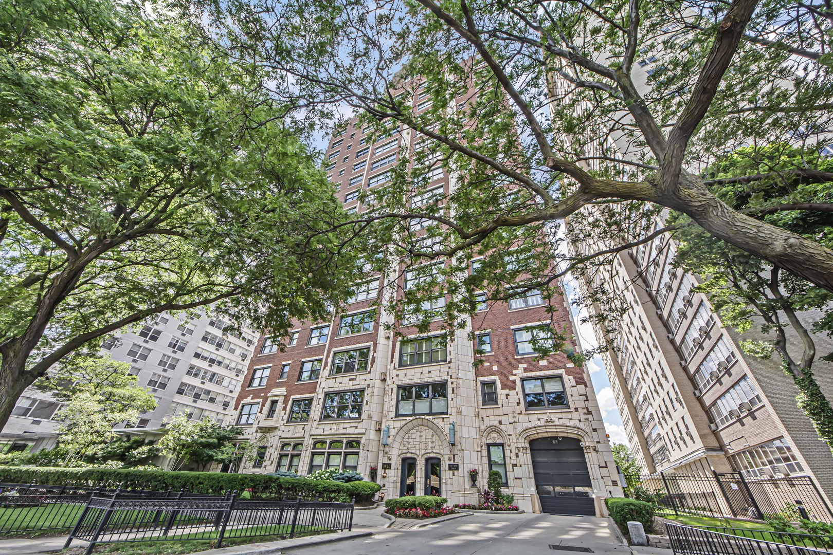 Welcome to Lake Shore Towers, an elegant and intimate co-op in the heart of East Lakeview. This meticulously maintained pre-war building offers the luxury of only two units per floor, ensuring privacy and exclusivity. With just 30 units, this vintage gem seamlessly combines classic charm with modern amenities. This expansive 3,000 square foot residence boasts 3 ensuite bedrooms, with an additional 4th bedroom currently utilized as an office. The home includes 3.1 bathrooms, featuring an updated primary bathroom with a large shower and a freestanding tub. Upon entering, a gracious foyer leads to an enormous living room, where a decorative fireplace, built-in bookcases, and oversized windows provide stunning views of the park. The formal dining room, located just off the foyer, offers ample space to comfortably seat 12 or more guests, making it ideal for entertaining.The bright, spacious kitchen is complemented by a butler's pantry that includes a prep sink and additional storage. A separate laundry room adds convenience to this well-conceived floor plan, which is perfect for today's living. Architectural details such as classic archways, rich hardwood floors, crown molding, and beautifully crafted doors add to the home's timeless appeal. Onsite attached garage parking is included. This building offers an array of amenities, including a wood-paneled lobby, 24-hour door staff, and an onsite engineer. Residents can enjoy a bright exercise room, a renovated terrace with grills, a bike room, receiving room, large basement storage, and additional free laundry. The building also features an elevator, a service elevator, professionally landscaped grounds, and a golf bag room. Pets are welcome. One garage spot is included. Enjoy the convenience of Lake Shore Drive living, steps from the lake, parks, shops, tennis courts, a golf range, schools, and public transportation. Financing up to 75% is available. Assessments INCLUDE real estate taxes, heat, indoor parking, cable, 24-hour door staff, maintenance, gas, and more.