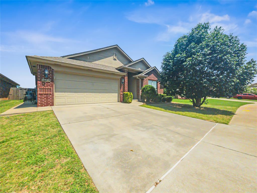 Great home, great location!  3 Beds, 2 Full Baths, AND a Flex Room that could be a study, 2nd dining, or as this is located directly off the main living area a nursery would be perfect.  Home offers an open floor plan with 10 foot ceilings in the living/dining/kitchen/flex, crown molding in living and entry way, and a mudroom with storage bench.  Kitchen has lots of cabinet/pantry space and solid surface countertops.  Primary bedroom "suite" is located away from the other bedrooms offers vaulted ceilings, double doors leading to primary bathroom that has shower, tub, vanities and large walk in closet.  Nice sized backyard, not small not big and no neighbors directly behind the home, just a big field.  2 car garage features shelving/hanging storage as well as in-ground 6-8 person storm shelter.  NEW HVAC in 2024, upgraded to a 4 Ton workhorse that made the home cooler in summer and a slight reduction in overall electricity costs. Other features such as paved side walkway, wired ethernet ports, and built-in surround speakers in the living room are all included.  Owner has an active Oklahoma Real Estate License #160155