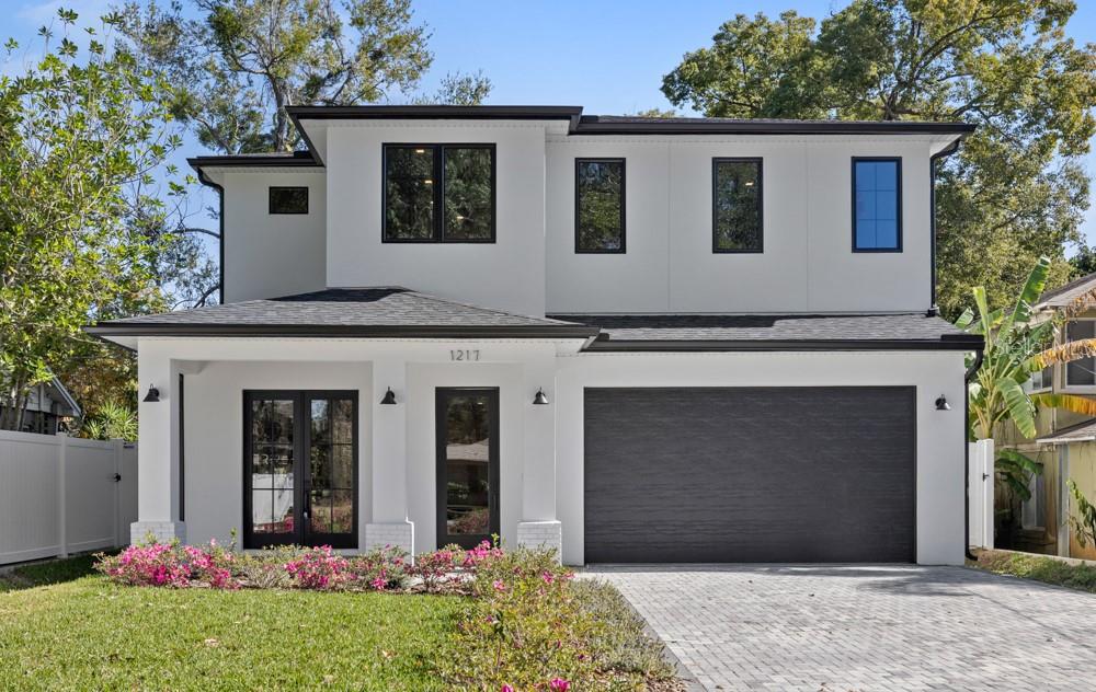 Under contract-accepting backup offers. Brand-new construction located in the heart of the Hourglass District, just south of downtown in SODO. This home offers a rare opportunity to own new construction in a highly walkable area surrounded by local restaurants, shops, parks, and everyday conveniences, only minutes from Downtown Orlando.The home spans 2,872 square feet and features 4 bedrooms and 3.5 bathrooms with an open, functional layout that prioritizes space and natural light. The main living areas flow easily from the living room into the kitchen and dining area, making the space practical for daily life and comfortable for entertaining without feeling oversized or forced.The kitchen is centered around a large island with premium appliances, clean cabinetry, and plenty of prep and storage space. Bathrooms are finished with modern tile and straightforward, timeless selections. A first-floor bedroom with walk in closet and an ensuite bath is perfect for multigenerational living or use as a functional home office.Upstairs, a generous loft provides additional living space, along with two more bedrooms that are well-sized and thoughtfully laid out. The primary suite includes a spacious shower, double vanities, and a large walk-in closet.A two-car garage and ample storage throughout the home keep things functional and organized, with no wasted space and no unnecessary extras. This home also has an extra-long driveway, which is a true luxury in these downtown neighborhoods. You also have a large fenced backyard with room to build a pool or backyard oasis.Located near local cafés, dining, neighborhood shops, and parks, with Lake Eola and Downtown Orlando just minutes away, this home offers city access while still feeling rooted in a residential setting.