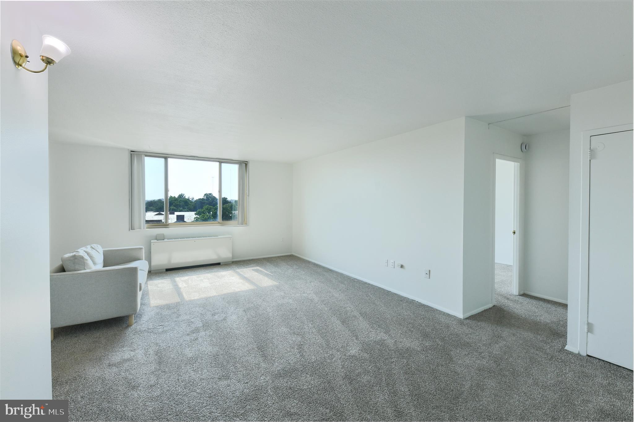 Welcome to 1 E University Pkwy Unit 908 a spacious 1-bedroom, 1-bathroom condo with incredible views overlooking Johns Hopkins University Campus, perfectly located next to the Johns Hopkins University campus in the heart of Charles Village/Guilford. This unit offers a rare opportunity to invest in a well-sized unit brimming with potential. It’s the perfect blank canvas for either a savvy investor or an owner-occupant looking to add personal touches and build real value. . The kitchen is fully functional and ready for your vision, while the primary bedrooms offers generous space. New carpet recently installed throughout the unit.The secure building features concierge services, key fob entry, and an array of amenities including a rooftop pool, a spacious lounge/rec area with a full kitchen for hosting, a fitness center, and a Smart Laundry Card System. Garage parking is available for lease at just $70/month. Located just steps from Johns Hopkins University, Union Memorial Hospital, and the greenery of Guilford Park, you’ll also enjoy easy access to the JHU shuttle, local restaurants, farmers’ markets, and shopping. While the property is being sold as-is, its location and layout make it a rare chance to customize a home in one of Baltimore’s most sought-after neighborhoods. Don’t miss the opportunity to unlock the full potential of this gem. Schedule your showing today , your next investment to add to your portfolio.