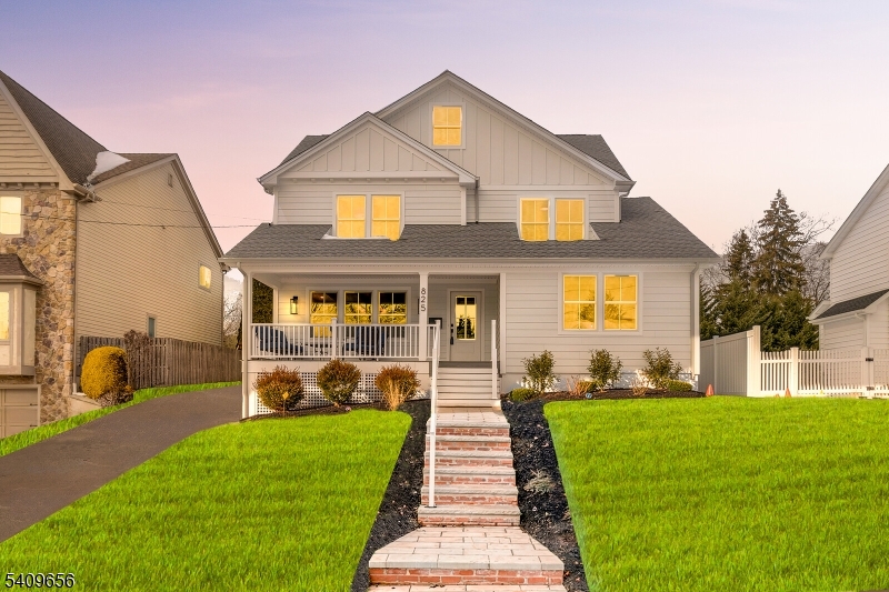 A truly stunning, fully renovated residence offering refined living across three levels, plus a finished basement. This home features 5 bedrooms, 4 full baths, and 2 half baths, showcasing a custom, brand-new kitchen, Family room fireplace with built in shelving on each side and designer finishes throughout. The thoughtfully modern layout includes a first-floor bedroom suitel. The 2nd level features a Jack-and-Jill bath shared by 2 bedrooms , a luxurious primary suite with walk in closet and spectacular spa-like bath plus a convenient Laundry Room. Up to a private third-floor retreat complete with a bedroom, full bath, and dedicated work area. An expansive 4-panel sliding doors lead to an elegant deck and patio perfect for sophisticated indoor-outdoor entertaining.