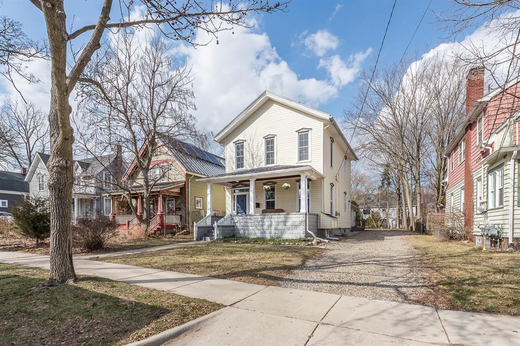 Walkable and wonderfully updated 1902 classic in Water Hill, adjacent to the best of downtown with a huge primary bedroom and soaring ceilings on both floors. Less than a half-mile saunter to Kerry Town, Sweetwaters, Zingerman's, hiking trails, world class restaurants, the Ann Arbor Farmer's Market and so much more. Find the perfect combination of character and contemporary living. Step inside to the living room and discover tall ceilings, oversized windows, and wide trim molding that fill the home with natural light and a sense of spaciousness. The custom-designed kitchen is a true showstopper, featuring white, slow-close cabinets, quartz countertops, and a cozy breakfast nook, while the dedicated dining room is perfect for hosting gatherings.The main floor also offers a large bedroom (or use as a magnificent home office!), an expansive mudroom, a convenient laundry room, and an updated half bath.Upstairs, you'll find a spacious primary suite with a full wall of closets and anupdated ensuite bath with a tiled shower. Two additional bedrooms and another updated full bathroom with a tub complete the second floor.The home also offers a walk-up basement that is ideal for storage.Enjoy the neighborhood-friendly covered front porch or relax in the sizable rear yard, which offers plenty of potential to add on, build a garage, or even an ADU. With all-new plumbing, electrical, and fiber optic internet available, this home is ready for modern living.Settle into this vibrant neighborhood and enjoy the perfect blend of historic charm and modern updates.