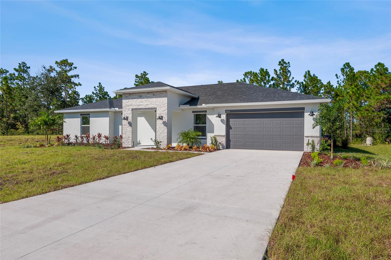 Stunning New Construction Home on Over 1 Acre in Wedgefield

Welcome to your dream home in the desirable golf and equestrian community of Wedgefield! The Palmetto Model, brought to you by Eastern Homes, is a beautifully designed 4-bedroom, 2-bath residence with a dedicated office—perfectly situated on an expansive 1+ acre lot offering privacy, space, and the perfect backdrop for Florida living.

Step inside to discover a bright and airy open layout with 9'4" ceilings throughout, providing a spacious and elegant feel. The main living areas feature durable, stylish tile flooring, while the bedrooms provide added comfort with plush carpeting.

At the heart of the home is a chef’s kitchen, complete with a large quartz center island, 42-inch upper cabinets, and a full suite of stainless steel appliances—ideal for entertaining or everyday meals.

The expansive primary suite is a peaceful retreat with a walk-in closet and a luxurious en suite bath featuring dual quartz vanities and a large standalone shower—all thoughtfully designed with comfort and function in mind.

Spacious laundry room provides ample room for storage, folding, and future upgrades like cabinetry or a utility sink.

Step outside to enjoy year-round Florida living on the oversized covered lanai, offering a perfect view of your serene backyard—ideal for a future pool, garden, or simply relaxing in a quiet natural setting.

Additional Features Include:

Open-concept living and dining areas

Split floor plan for added privacy

Versatile office/flex space

Large laundry room 

Oversized lot with endless potential

All of this is located in a sought-after community with optional HOA, convenient access to SR-528, and just a short drive to Orlando International Airport, downtown Orlando, and Florida’s east coast beaches.

Don't miss the chance to own this thoughtfully crafted new construction home on acreage—schedule your private showing today!