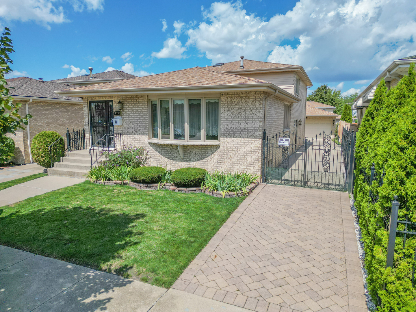 Welcome to this oversized semi-custom brick tri-level with a sub-basement, offering 4 levels of comfortable living and more than 2,200 sq. ft. of space. Perfectly situated on a quiet cul-de-sac, this home features 4 bedrooms and 3 full bathrooms, including a private master suite. Step into a bright foyer that opens to a spacious living and dining room accented by a bay window. The eat-in kitchen, highlighted by a skylight and filled with natural light, offers abundant cabinetry and plenty of room for family meals. The 2nd floor includes 3 bedrooms and 2 full baths, while the ground-level lower level features a large family room with a cozy gas fireplace, a 4th bedroom, a full bath, and sliding doors leading to the backyard and patio. One level below, the expansive unfinished sub-basement provides endless possibilities for storage or future living space. Additional highlights include hardwood floors throughout, a private side drive, a 2-car garage, and a beautifully maintained fenced yard that enhances both curb appeal and privacy. Pride of ownership is evident throughout this home, cherished by the same family for over 30 years. Conveniently located near shopping, dining, schools, expressways, and public transportation. This is an estate sale, and the property is being offered in as-is condition.