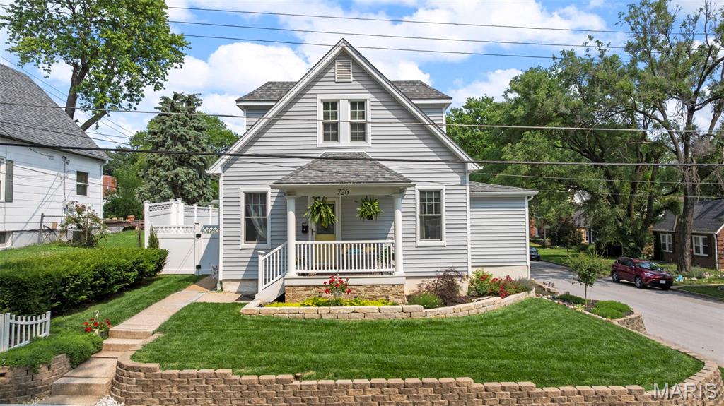 A HIDDEN GEM! RENOVATED 4BR 2BTH 1.5 story in Historic City of St Charles w/a private inground heated pool! Located just a short walk from Lindenwood University & Historic Main St this home is unmatched in all it has to offer where elegant preservation of the past meets top of the line renovations. Nestled on the corner of S 8th and Water St this home has charming curb appeal w/new roof & siding, lush landscaping, oversized detached 2 car garage, new privacy fence & sparkling inground pool. The updated interior still has all of it's historic charm w/gleaming HW floors, tall ceilings & crown molding. Step into the sitting rm you'll notice the French doors that lead you to the formal dining rm. You'll LOVE the new kitchen w/custom cabinetry, Quartz countertops, new SS appliances, composite sink, LG pantry & bkft bar. The family rm w/tons of windows features a WB fireplace flanked by windows & door to the paver patio looking out to the level backyard & pool perfect for Summer fun. The ML primary suite has new LG closet leading into the luxurious private BTH w/custom Onyx shower. Add'l bath & laundry complete the main. The upper lvl offers 2 generously sized BR's. The finished LL provides the 4TH BR, a home office & family rm all w/new carpeting. Add'l updates include new lighting & fixtures,  professionally painted from top to bottom w/inviting relaxing colors. Great location w/easy access to major hwys, dining, shopping & the river front! The list goes on and on!  A MUST SEE!