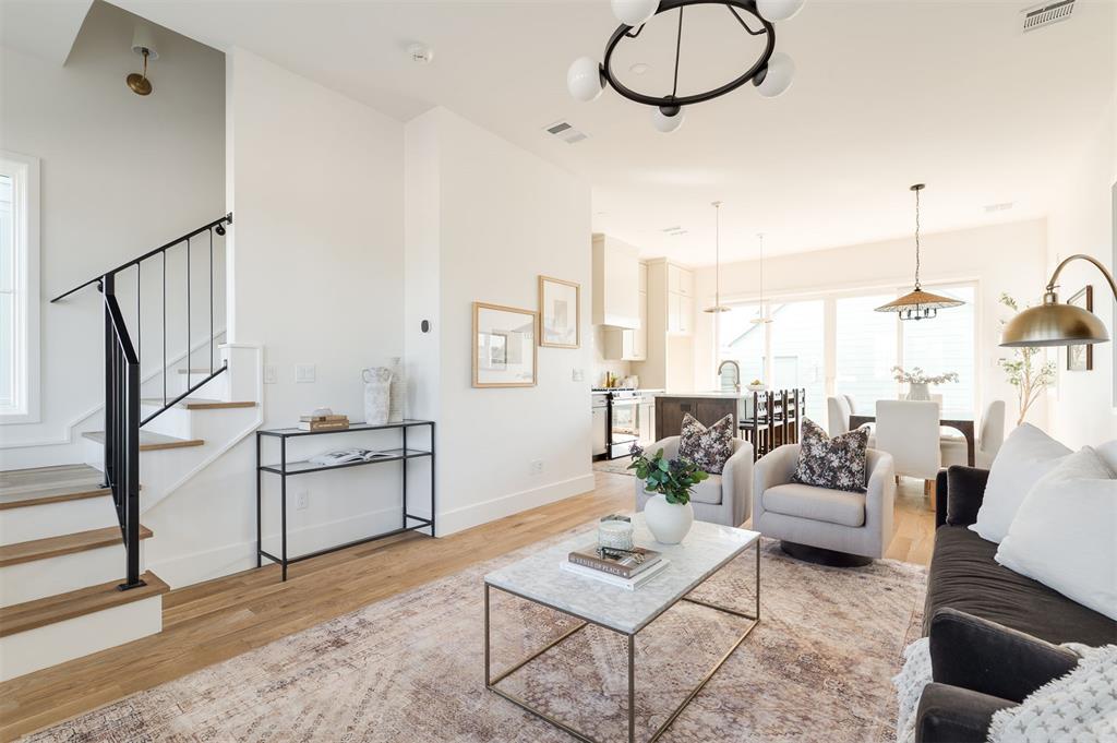 This three-story Solo plan is filled with natural light and thoughtfully designed living spaces. The open-concept first floor features sliding glass doors that seamlessly connect the kitchen and dining area to a private back courtyard—perfect for indoor-outdoor living. The entire second floor is dedicated to a spacious primary suite retreat, complete with a large walk-in closet, private bathroom, and full laundry room. The third floor includes two secondary bedrooms and a full bathroom, offering comfortable accommodations for family, guests, or a home office setup. Living in Wheeler District means enjoying a vibrant community filled with parks, shops, restaurants, and events—all just steps from your front door.