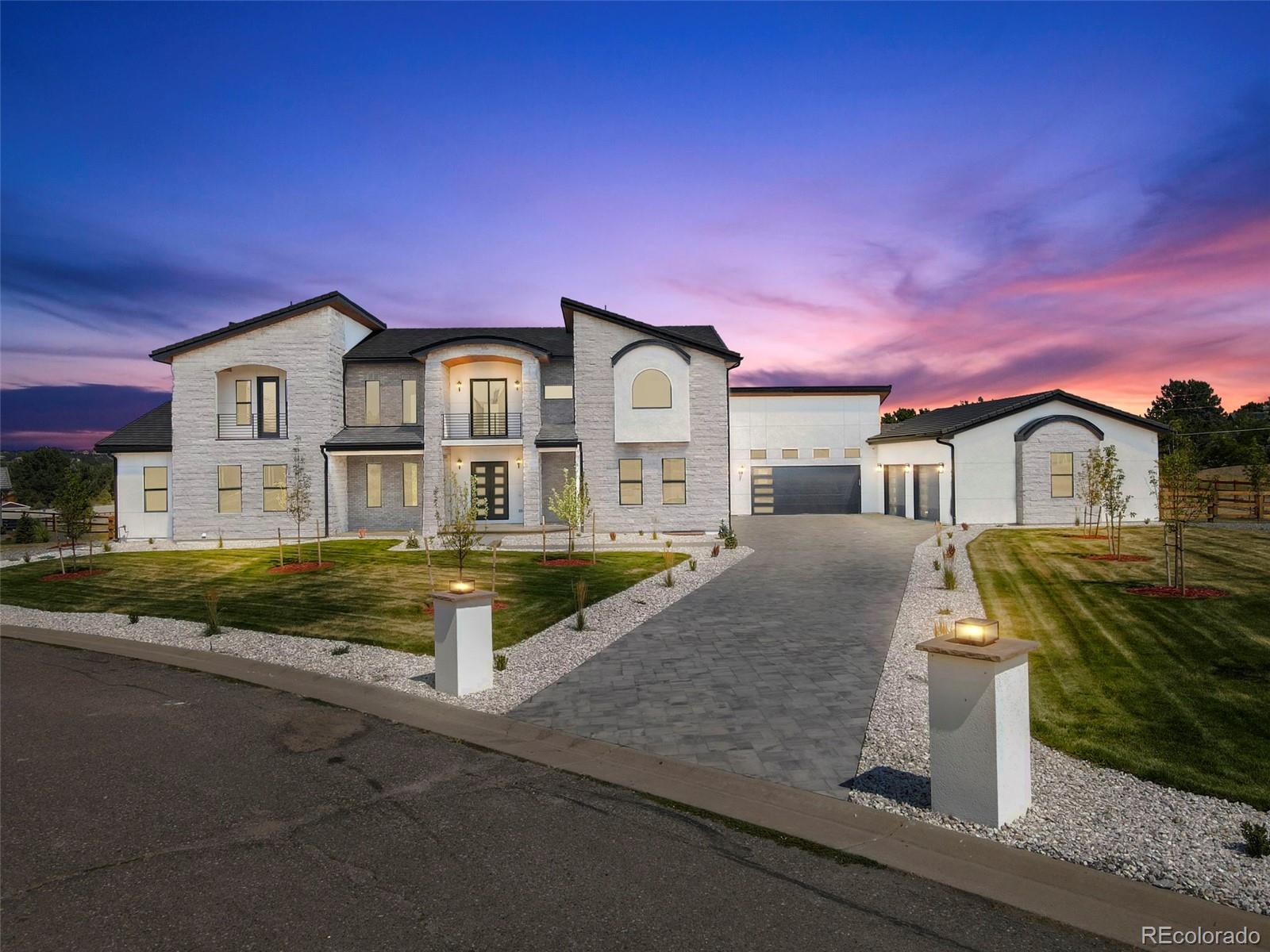 Step into a world of refined elegance with this extraordinary custom new build, nestled in the highly sought-after Estancia neighborhood. Crafted with meticulous attention to detail, this architectural masterpiece offers 6 bedrooms and 8 bathrooms. From the moment you enter, you're greeted by soaring ceilings, floor-to-ceiling windows, and eye-catching spiral staircases crowned with luxury pendant chandeliers. The open-concept layout showcases top-of-the-line appliances, designer lighting, and exquisite finishes throughout. At the heart of the home lies the gourmet chef’s kitchen, featuring custom cabinetry, a spacious walk-in pantry, oversized island, and elegant chandeliers. This space effortlessly flows into the expansive great room, ideal for both intimate gatherings and large-scale entertaining. The main-level primary suite is a true retreat, complete with a spa-inspired ensuite, a generous loft area, and three oversized walk-in closets. Every element was designed for comfort, privacy, and opulence. Downstairs, discover a host of luxury amenities including a private sauna, state-of-the-art home theater, full wet bar with custom countertops, and a large exercise room. This one-of-a-kind residence is more than a home, it's a statement. Don’t miss your chance to own a true gem in one of the area's most coveted communities.