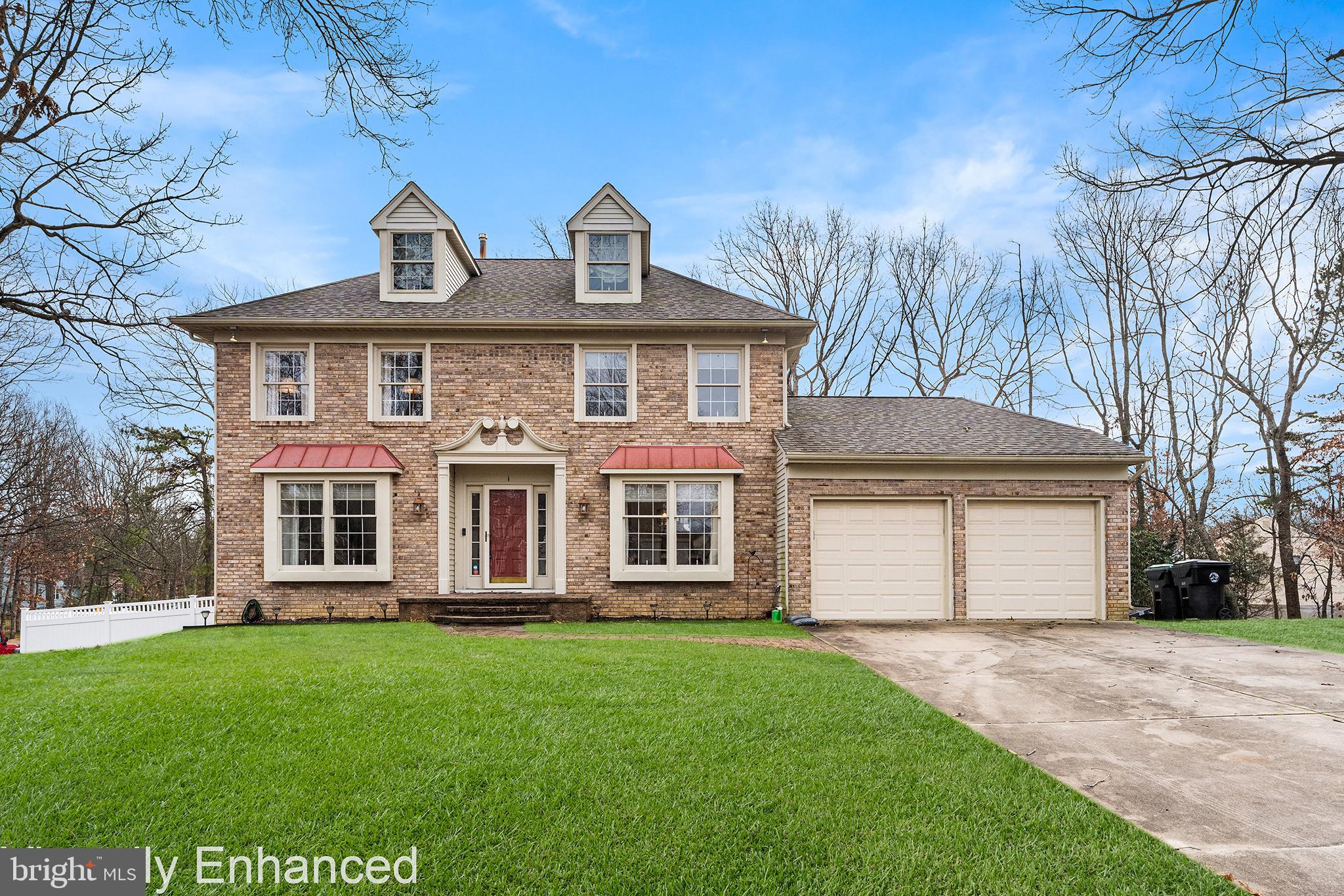 Welcome to this warm and welcoming brick-front Center Hall Colonial, located in the sought-after Wilton’s Corner neighborhood and perfectly situated on a corner lot within a quiet cul-de-sac. Lovingly cared for by the same owners for over 30 years, this classic two-story home offers timeless curb appeal, thoughtful features, and inviting spaces designed for both everyday living and entertaining.Inside, you’ll find hardwood flooring in the entryway and throughout the kitchen. Just off the kitchen is a warm and inviting family room with a fireplace, and French doors off the family room lead to a balcony, creating a seamless indoor-outdoor flow. The main level also includes a formal living room, ideal for a playroom or home office, a formal dining room, a convenient half bath, and a spacious laundry area located just off the garage.Upstairs, the home features four generously sized bedrooms. The primary suite offers ample space and includes a private ensuite bath, while the three additional bedrooms share a full hall bath.The fully finished basement is a standout, complete with a custom built-in wet bar, an additional bedroom, and a private full bath—perfect for guests, entertaining, or relaxing. The home also provides plenty of storage throughout, along with security and sprinkler systems for added peace of mind.Step outside to enjoy a private vinyl-fenced yard with a paver patio, ideal for outdoor entertaining. Additional highlights include a two-car garage, ample parking, and easy access to shopping and major highways.Ideally located in South Jersey, this home offers convenient access to Philadelphia, Mount Laurel, and Atlantic City, making it an excellent choice for professionals seeking flexibility as careers evolve. Close to commuter routes, dining, and everyday amenities, yet tucked into a quiet, established neighborhood. A low HOA fee and community pool complete this exceptional offering.