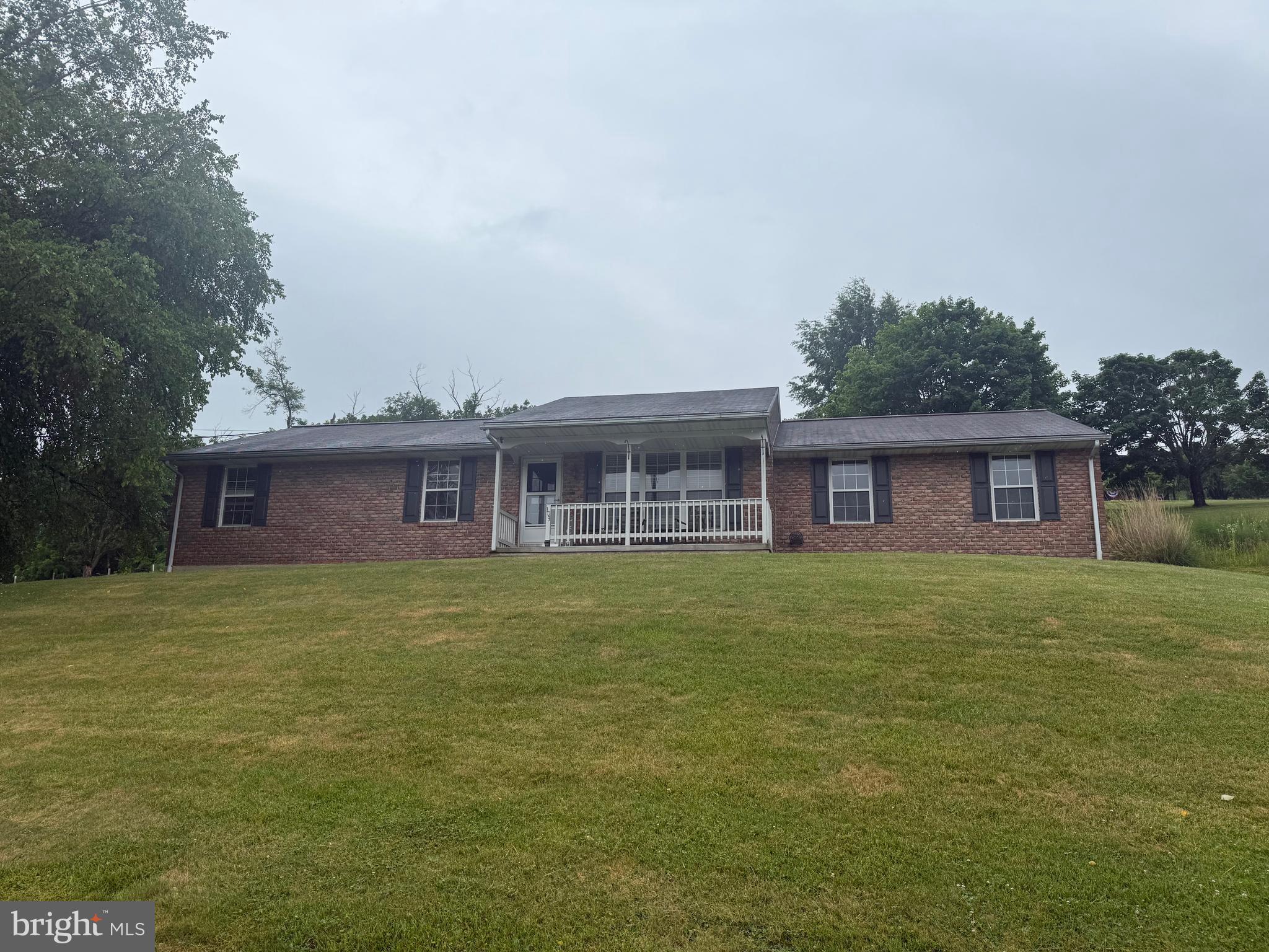 Brick and Vinyl Rancher. First floor living. Country Kitchen, 3 Bedrooms and 2 baths. Living Room. Family room in basement with bar & propane gas stove. Fourth bedroom also located in basement. 2 car attached garage. Conveniently located to Route 73 Very Good Condition.