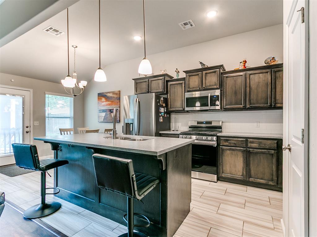 Welcome to 4617 Osprey Drive in Norman! Conveniently located near OU, shopping, dining, interstate access, and a nearby golf course, this nearly new one-owner home built in 2021 offers thoughtful upgrades and a functional layout designed for everyday living.  Upgrade features include extended front and back patios, full privacy fence, window treatments, new kitchen stone countertops, and easy-to-maintain hard surface flooring throughout the main living spaces. A storm shelter in the garage adds extra peace of mind during Oklahoma storm season.The split floor plan offers home owner privacy with two secondary bedrooms and a shared hall bath on one side of the home, while the spacious primary suite is tucked away on the other and features a vaulted ceiling, double vanity sinks, garden tub, glass shower, and a large walk-in closet. The open main living area flows effortlessly into the kitchen, dining, and backyard spaces, making it ideal for relaxing or entertaining. The kitchen is well appointed with stainless steel appliances, a central island with additional counterspace, a  true pantry, and plenty of storage space making meal prep a breekze. The dedicated study with sliding barn door located near the front of the home makes working from home easy.Outside, enjoy a backyard that opens to green space with afternoon shade for year-round living, plus additional green space in front of the home. Solar panels to remain with the home adding additional perk of low energy cost. With its thoughtful upgrades, move-in ready condition, and competitive value this home is truly worthy of closer look.