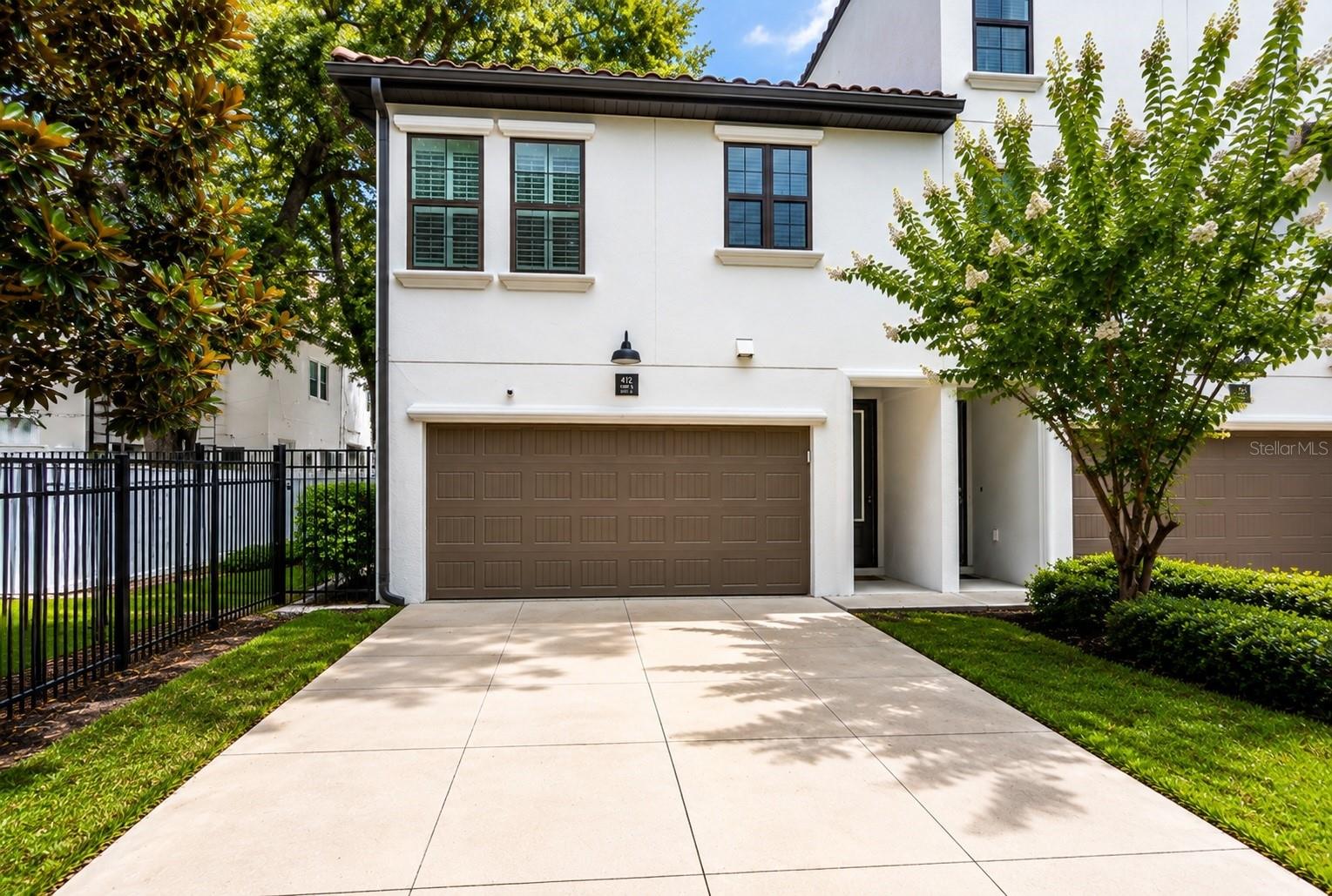 Welcome home to this beautifully appointed Mediterranean-style townhome in the heart of South Tampa’s highly sought-after Hyde Park/SoHo area. Built in 2020 by David Weekley Homes, this two-story residence has been meticulously maintained and offers modern finishes, thoughtful design, and low-maintenance living in an unbeatable location. The first floor features a versatile guest bedroom with a built-in Murphy bed and built in wall closet system allowing the space to easily transition between a private guest suite and a functional home office. A full bathroom and access to a charming, shaded covered patio complete the first level. The wood-tread stairs lead to a bright and spacious open-concept living area filled with natural light. The beautifully designed kitchen overlooks the great room and features a natural gas cooktop, white shaker cabinetry with crown molding, quartz countertops, stainless steel appliances, a corner pantry, and a sunny kitchen window. This level also features a convenient powder room and dedicated laundry closet, thoughtfully located just off the main living area. The spacious primary suite offers a walk-in closet and an ensuite bath with a double vanity. Additional features include a turfed side yard perfect for relaxing outdoors, tankless gas water heater, zoned HVAC system, impact-resistant windows, security system, and a two-car garage. Located in the Mitchell, Wilson, and Plant school district and just moments from Hyde Park Village, Bayshore Boulevard, and some of South Tampa’s best shopping, dining, cafés, and entertainment. Enjoy the convenience of a low-maintenance lifestyle, with the HOA providing landscaping and exterior building maintenance. Move-in ready and perfectly positioned to enjoy the best of South Tampa living! Schedule a tour today!