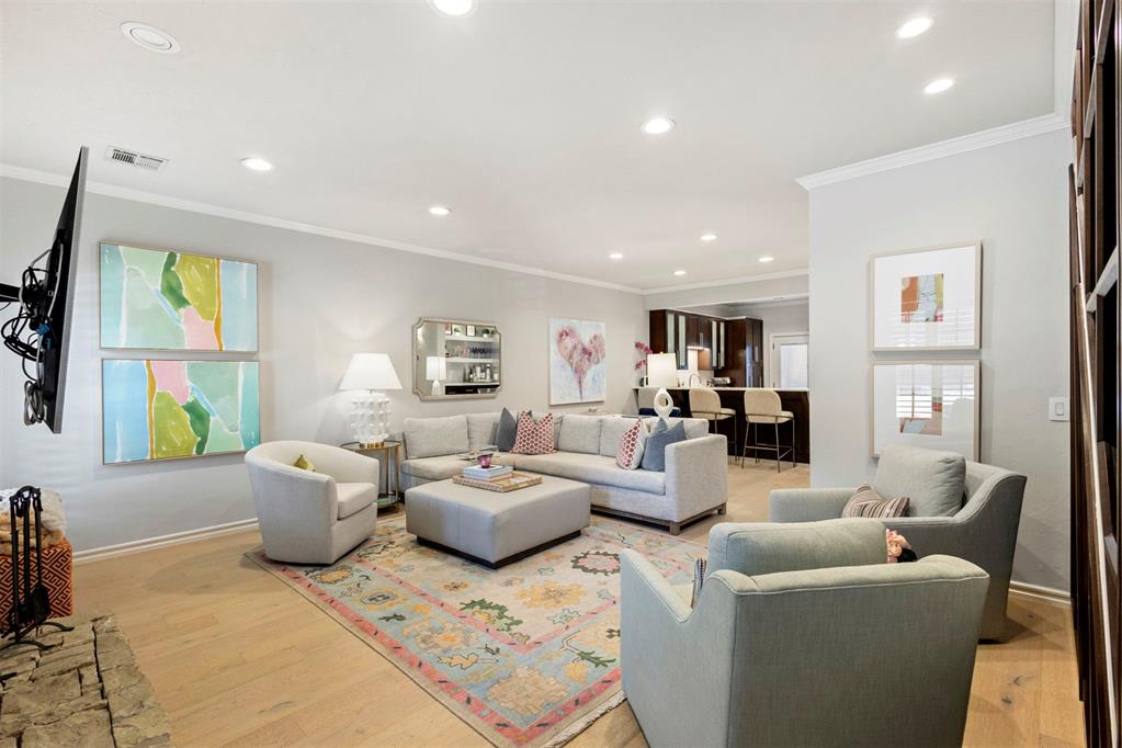 This beautifully updated condo features two spacious upstairs en-suites, including a large primary suite with a double vanity and a custom closet. The living room boasts soaring ceilings and a cozy fireplace, flowing into an open-concept kitchen with two dining areas—perfect for entertaining. Rich wood floors run throughout, adding warmth and elegance to every room. Step outside and enjoy your own private outdoor space just off the kitchen—ideal for relaxing or dining. The garage offers convenient overhead storage, perfect for keeping things organized.
The HOA covers exterior insurance, maintenance, the community pool, gated entry, and security—offering you peace of mind and low-maintenance living.