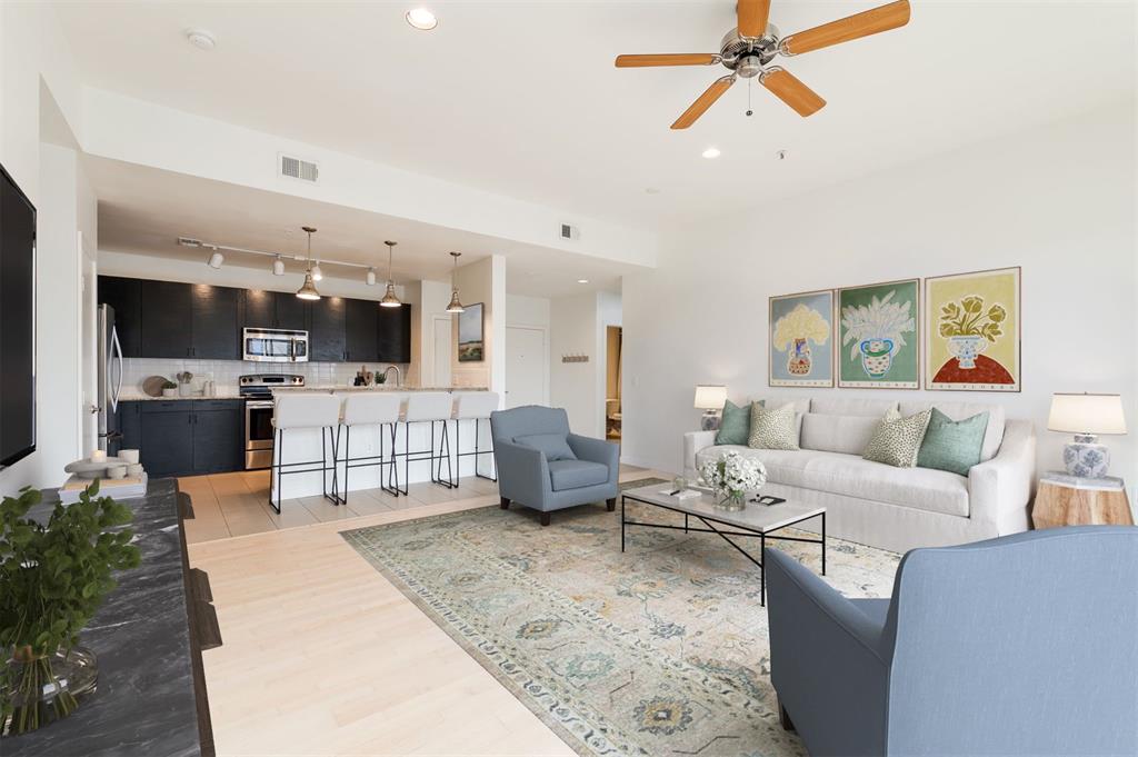 Opportunities like this don’t come along often. Perched within the gated and highly sought-after 401 Lofts, this top-level condo offers modern living with unbeatable access to the University of Oklahoma, Campus Corner, and Gaylord Oklahoma Memorial Stadium. This well-maintained 2-bedroom, 2-bath residence provides a true lock-and-leave lifestyle with thoughtful updates throughout. The kitchen features granite countertops, stainless steel appliances, and ample cabinetry, flowing seamlessly into a light-filled living space with wood flooring, oversized windows, and sliding glass doors that open to a private balcony. The primary suite includes a spacious closet and an attached bathroom with a glass-enclosed shower finished with tile and granite countertops. A secondary bedroom with a generous closet is located adjacent to a guest bath with granite countertops and a tub/shower combination. Additional highlights include two reserved parking spaces in the gated covered and garage. Residents of 401 Lofts enjoy a full suite of amenities, including a pool, fitness center, club room, elevator access, outdoor grilling area, fire pit, and more. HOA dues include exterior insurance, water, sewer, and trash.