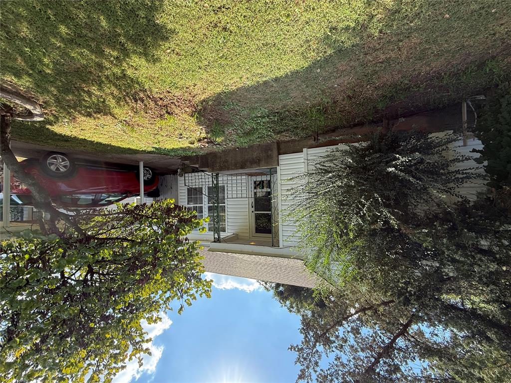 Spacious 4-bedroom with home with cute curb appeal.