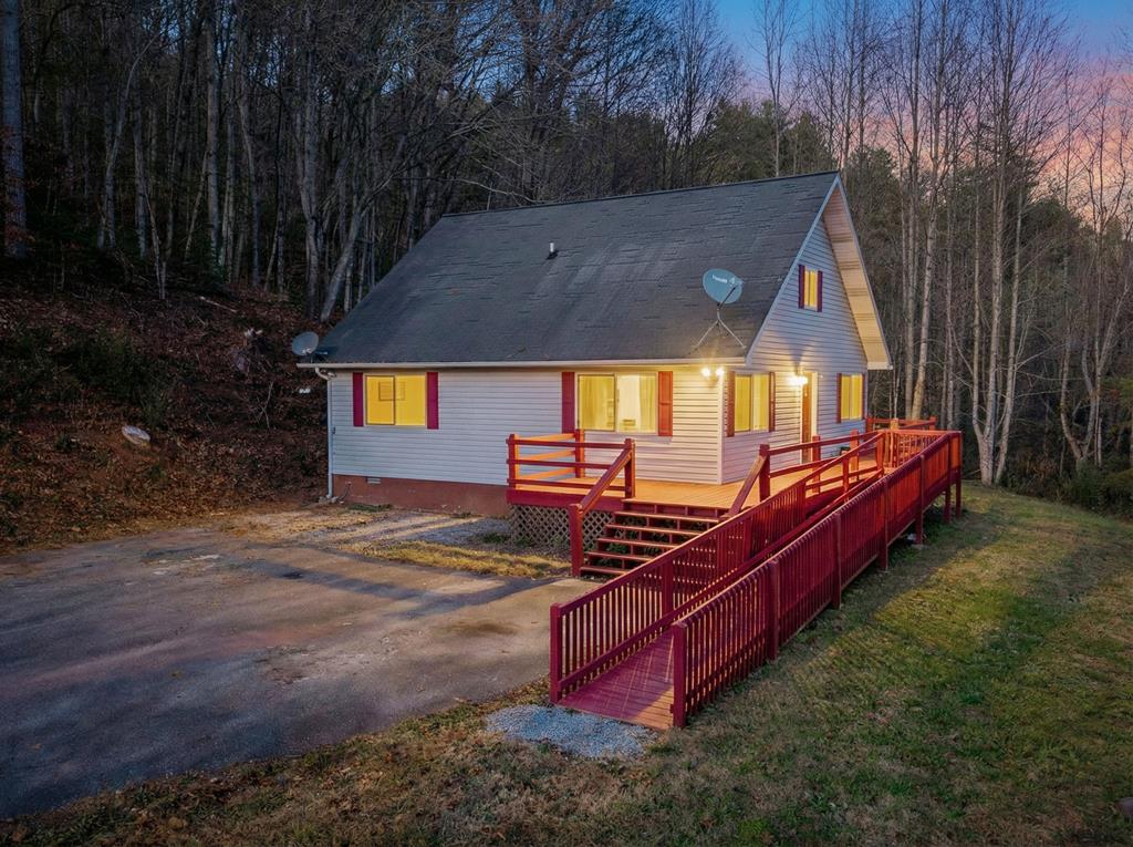 This 3-bedroom, 2-bath home on 0.71 acre offers a livable space with strong potential, but it will require updates and repairs to truly shine.  With 1,536 sq ft, paved drive access, and a deck for outdoor living, the layout provides a solid foundation for those ready to invest in improvements.  Fiber-optic internet is already in place, and the near-equidistant location between downtown Murphy and Andrews puts you close to dining, shopping, and recreation.  If you're looking for a mountain property to make your own, this fixer-upper is a chance to build equity and create something special.