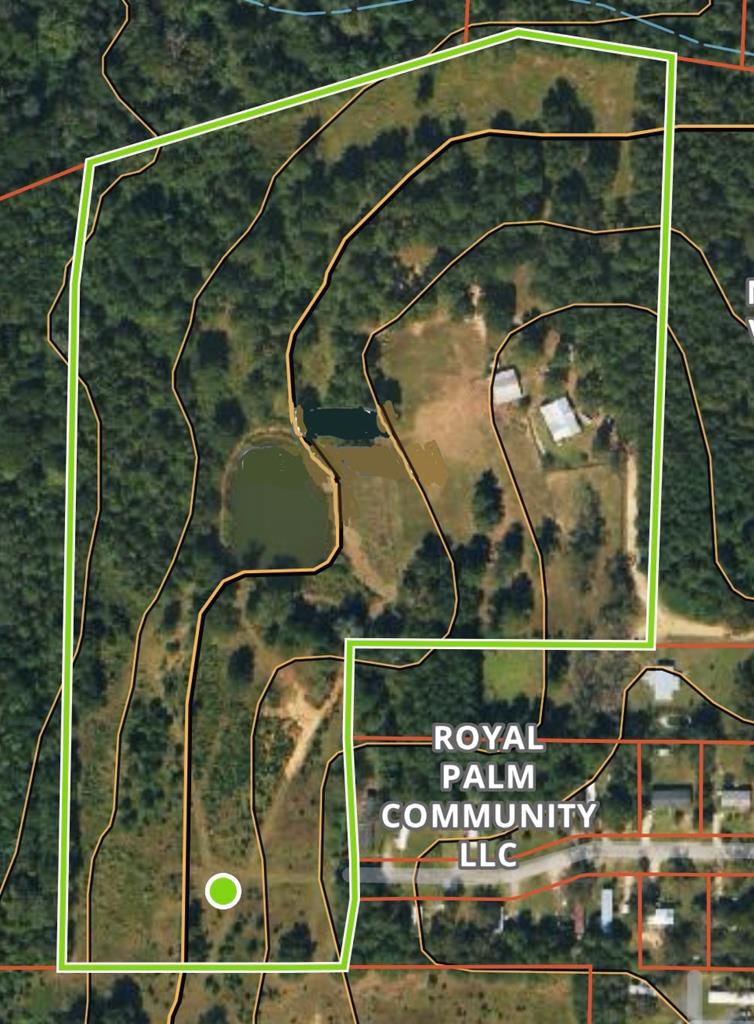 This 23.62-acre parcel of land, nestled the county of Cairo, offers a perfect blend of convenience and privacy. It features four pastures, with three fully fenced and the fourth fenced on three sides. Water lines are conveniently laid out for easy watering of farm animals, and water troughs will remain. A barn and two sheds provide additional storage and shelter.  The pond is teeming with catfish and brim, making it an ideal spot for fishing enthusiasts. The property also includes a triple-wide mobile home with a spacious living area, a covered deck off the back, and a large living room with laminate wood flooring, a wood-burning fireplace, and vaulted ceilings.  The house has undergone several updates, with some still in progress. The hall bath boasts new flooring and a vanity, while the master bath will feature a new vanity, commode, and flooring, which can be installed if the owner doesn't have time before selling.   In 2021, the new water heater and dishwasher were installed, and the HVAC system is three years old, while the roof is ten years old.  This property offers a wide range of amenities and features, making it an attractive option for those seeking a peaceful country living experience with the convenience of city life.