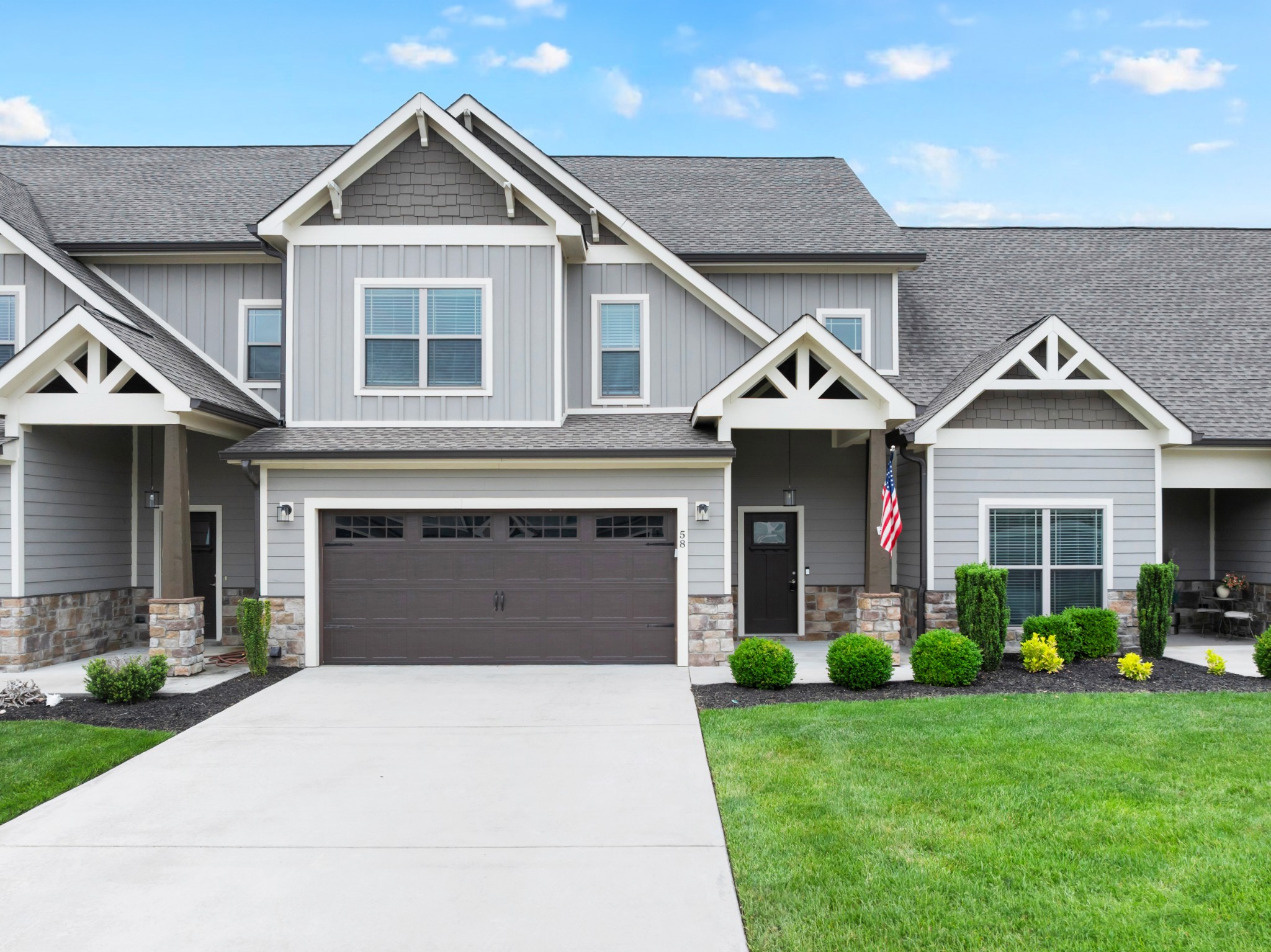 Low maintenance living meets lake life luxury in this beautifully designed townhome tucked inside a gated community loaded with amenities! Whether you're looking for a full-time residence or the perfect weekend escape, this one checks all the boxes. Step inside to find a spacious layout featuring a primary suite on the main level, offering convenience and comfort. The spa-like bath is your personal retreat, perfect for unwinding after a day on the water. The open living space flows effortlessly, ideal for entertaining or simply relaxing at home. Out back, enjoy your private fenced backyard, a rare find for townhome living-perfect for pets, morning coffee, or evening gatherings.  And the lifestyle? It's hard to beat. Hop on your golf cart and take a quick ride to the marina and waterfront restaurant, where lake days turn into sunset dinners with ease. All of this within a gated community packed with fun things to do, offering both security and a true resort style feel.