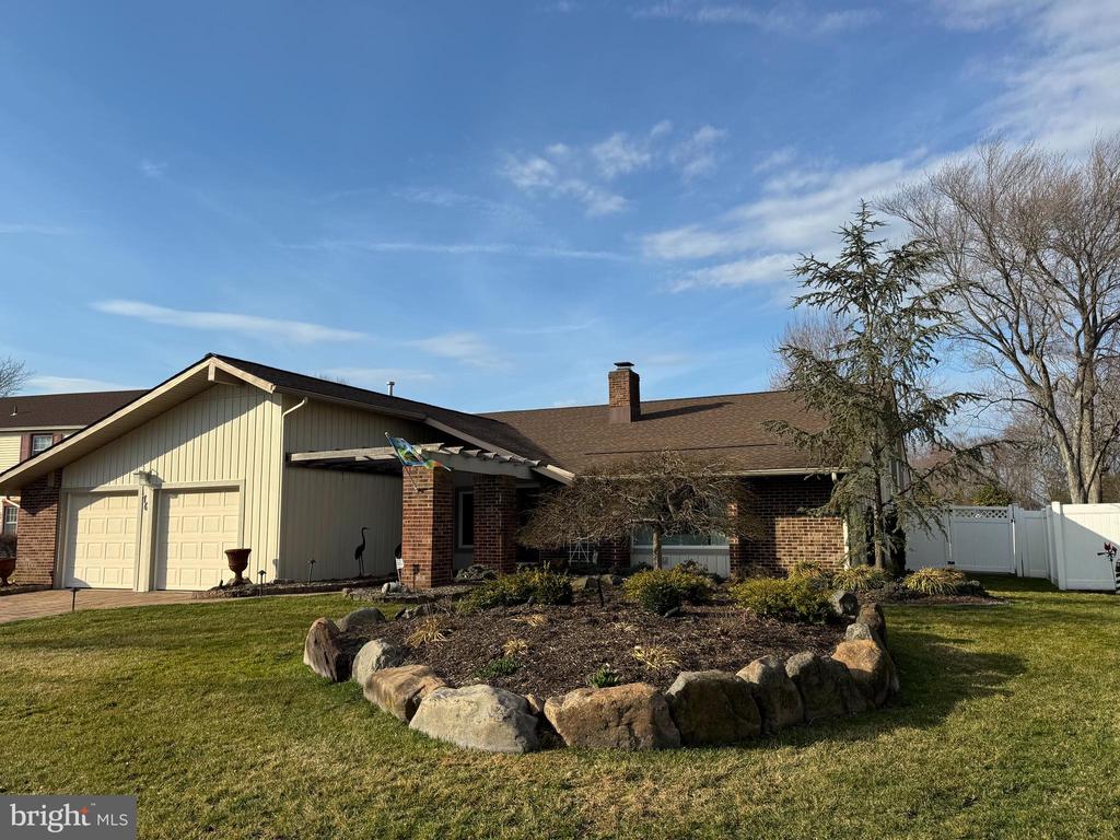 76 Kent Avenue is truly one of a kind.    This home contains 2168 sq. ft , 4 bedrooms, 2 Baths,  a 2 car garage and a sunroom all on one floor.   The property has been updated and maintained continuously...with new siding in 2016, new insullation in 2016, new gutters in 2017,  and a new roof in 2017.76 Kent has been  professionally landscaped with hardscsaping and lighting and well cared for.  It has an unobstructed view and access to the neighborhood park.  There is no other property like this  gorgeous home in  all of Marlton's Cambridge Park .As you pull up to the house, you will note the hardscaping which includes a raised garden surrounded by landscape boulders, plantings and lighting which accentutes the warmth which surrounds this home.  The two car garage is fronted by a custom paver driveway and walkway which leads to the exquisite full length decorative glass front door with matching side panel.  The front entrance is accented by substantial landscaping, lighting and hardscaping under an open slatted timber awning.Inside the front door, ceramic flooring  leads from the  entrance into an elegant living room with a warm sunken sitting area...all under a vaulted ceiling.   The space incorporates a dining area which is serviced by a "butlers pantry".   Large picture windows provide abundant natural lighting. Following the entrance into the home is a large family room, breakfast area and kitchen under vaulted ceilings.  From these areas we look into and through a spectacular sunroom.  Its unique framing and glass provide peaceful views of the landscaped back yard.  Inside the sunroom enjoy the full length rock garden,  vaulted ceiling, track lighting. sky lights, wet bar and split system air conditioning.  This space  is truly made for making  memories. The kitchen is ready for the chef in everyone...boasting  new appliances including a Bosch Built-In Wall Oven with convection fan system, Bosch Microwave Oven,  Bosch 5 burner cook top,  Energy Star Certified Bosch Stainless Steel Dishwasher, 1/2 HP  Garbage Disposal,  an Energy Star Certified LG 24.7 cu. ft French Door Refrigerator with double freezer drawers.Situated in the laundry room is a Kenmore Elite Electric Dryer with 7.3 cu. ft.  capacity with matching washing machine.A hallway connects with the master bedroom suite.  Its picture window provides a view across the back yard and into the park.   The  master suite contains a tiled walk-in shower, separate vanity and walk-in closet .  The master suite has its own split system air conditioning unit to add additional comfort control to the energy efficient HVAC system which services the entire house.The additional full bathroom and three additional bedrooms make this home one to grow with you.The two-car garage provides access to the well insulated attic and storage area via a set of pull-down steps.    The home is serviced by a newer Energy Star Certified  Carrier HVAC system  with a variable speed heat pump with Greenspeed (TM) Intelligence, a EnergyStar Certified Navien Tankless Water Heater, Reme Halo In-Duct Air Purification System.  A Modine gas fired heater services the sunroom for cozy winter evenings.  Three Mitsubishi remote control Split System units each in the master bedroom, living room and sunroom help provide total comfort throughout the year. Note:  reference to room sizes/dimensions are approximate.  Square footage is as built.