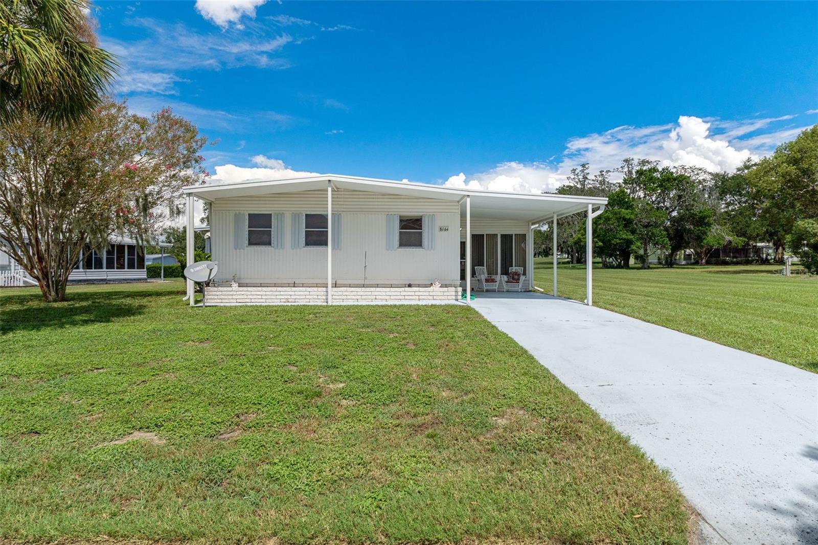 This turn-key 2-bedroom, 2-bathroom home on the golf course boasts an airy open floor plan and an impressive, oversized primary suite. Enjoy sunny Florida days poolside in your private in-ground pool or relax in the spacious enclosed porch. Functional utility room with dedicated golf cart storage for easy course access. Excellent layout, ex-large lot, newer HVAC (2021) and water heater (2024) Located in the vibrant & active 55+ High Point Golf Community that offers tons of amenities such as Golf, tennis, pickleball, heated pool, social events and so much more. High Point is located close to shopping, restaurants, entertainment, and medical facilities. Low HOA fees and you OWN YOUR OWN LAND.