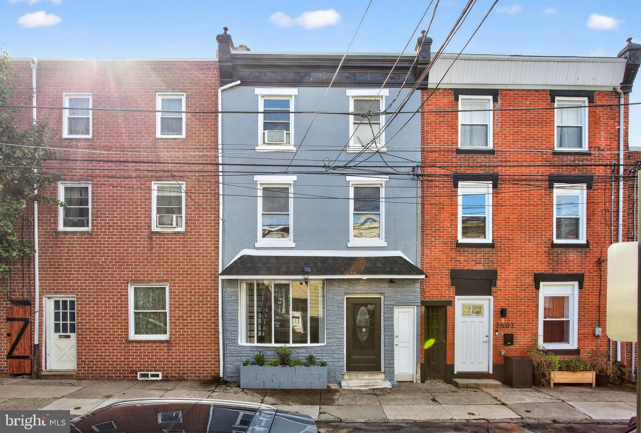 This is a beautifully remodeled home in the heart of Fishtown.  The property is a four bedroom with two full bathrooms, with another extra room on the first floor. This is a true unicorn property; spacious, clean and on the top of everything: an indoor garage in the back of the home.The living and dining room are combined with elegant lines and a lot of natural light, with high quality flooring throughout. The first floor continues with a very spacious kitchen, equipped with a set of modern appliances. There is an extra room on the first floor in the extension of the kitchen space. A very spacious, full bathroom is accessible from this area, and the space is concluded with  a laundry room.  From a laundry room, you can access the garage in the back of the first floor. Two bedrooms are located on the second floor and with a newly remodeled full bathroom with a standing shower. The rooms have plenty of closet space.  The third floor is set with two large bedrooms full of light, with clean and high quality laminate flooring, and plenty of closet space.  The basement is smaller in area, however, it can be a very functional space with a lot of potential as a storage or a game room.This home is an incredible value, very spacious and it offers great features. In addition, the home is equipped with a time tested and proven circular flow radiator heating system and it works wonderfully with an added multi split system of heating and cooling. The property has a sum pump that will prevent the property from any water intrusion and damage. This is a real deal. The virtual staging photos indicate the potential of this incredible home in the heart of Fishtown.
