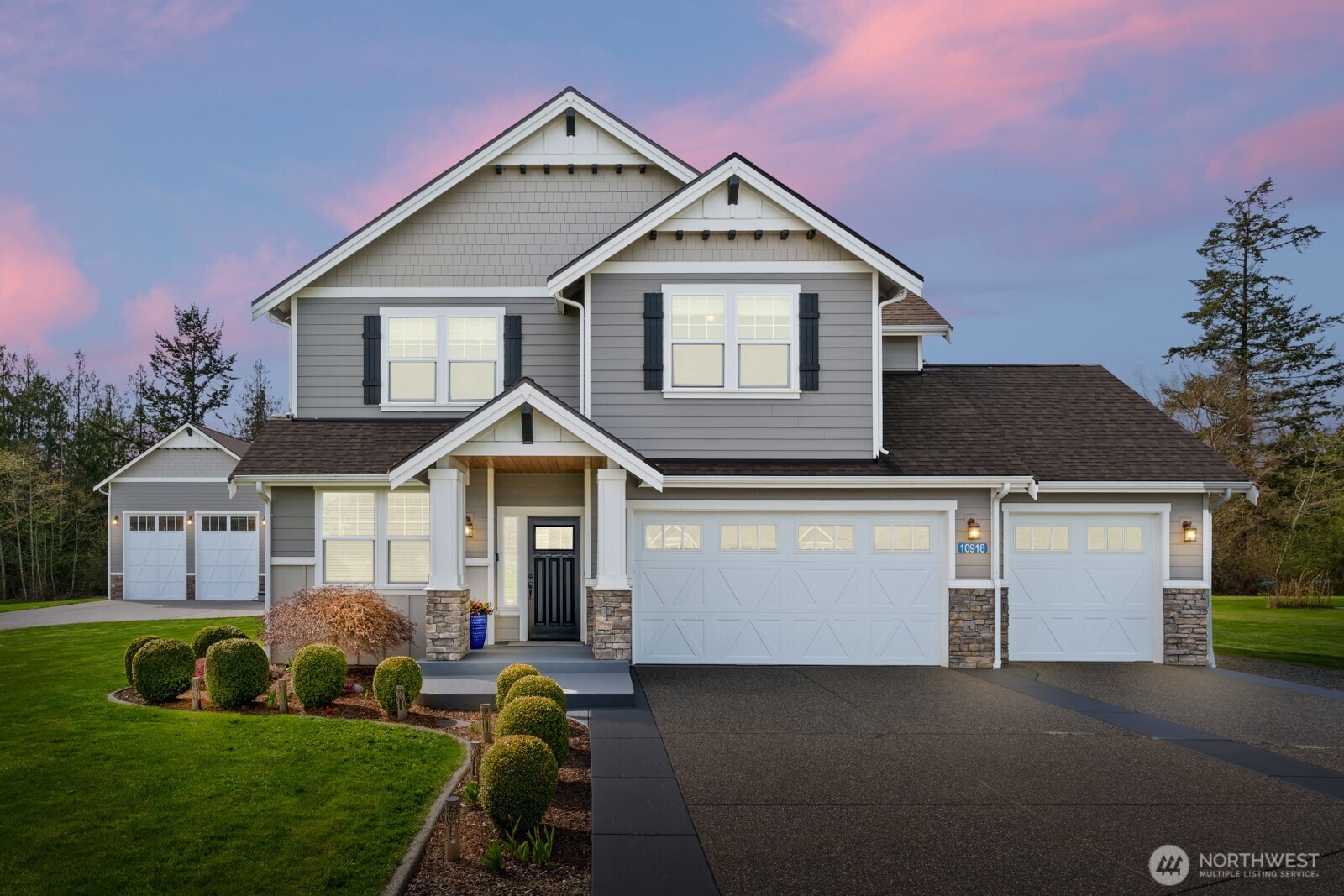 Stunning home in highly desirable area of Bay View. The main floor of this like new home features oversized kitchen, pantry, living room, gas fireplace, half bath, office with double doors as well as a very cute utility room. Upper level boasts 4 bedrooms, 2 full baths and a bonus room! Master bedroom with 5 piece en-suite with large walk-in closet. Home sits on nearly an acre with a 52x42 shop, 14 ft doors and aggerate concrete entrance. Above the shop is a 900 sqft living space with stylish finishes. This apartment is 1 bed/1 bath, kitchen with island, quartz counters and a living room. Outside you will find a patio with stamped concrete perfect for entertaining. Home backs up to treed land for privacy. You won't be disappointed!