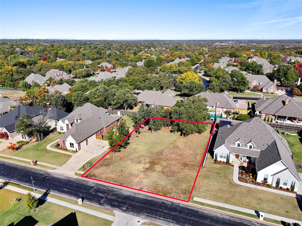 Its your chance to acquire a lot in Olde Edmond! A fabulous gated neighborhood in east Edmond. Bring your own builder and build your dream home today!