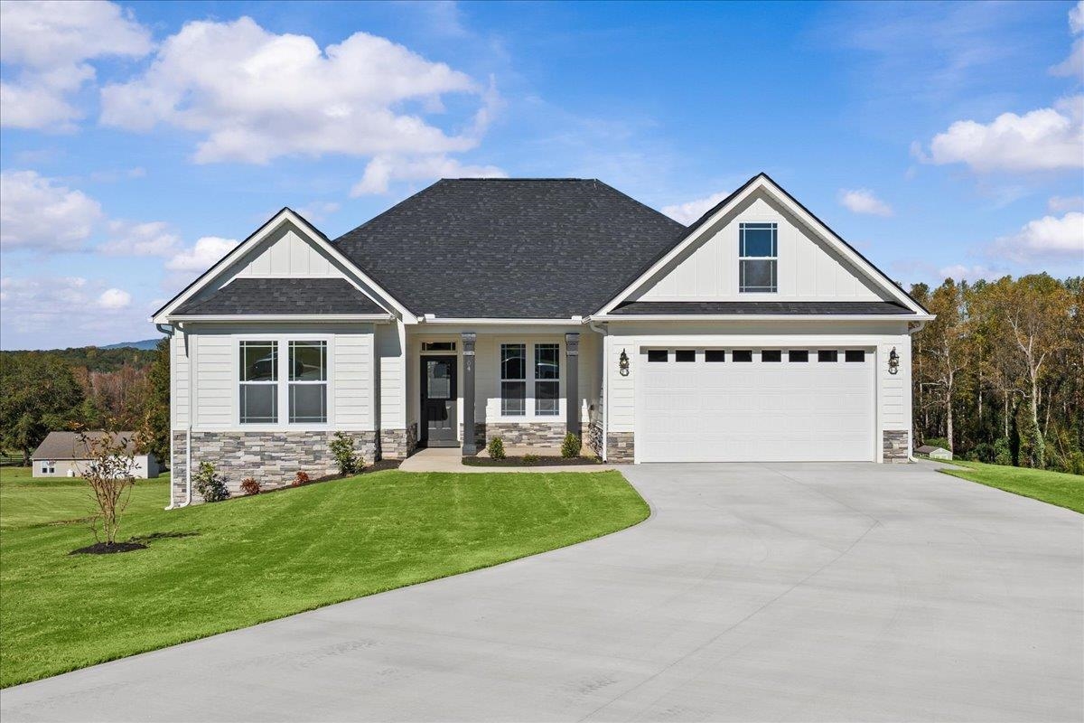 Welcome to Your Dream Home in Inman, SC! Just completed and move in ready as of 11-6-2025  Set on a full 1-acre lot near a peaceful horse farm, this beautiful new construction offers stunning mountain views and the perfect balance of luxury, craftsmanship, and tranquility in the heart of Inman, South Carolina.  Step inside to a spacious entryway that opens into a bright, open-concept living area anchored by a cozy gas fireplace. The flowing layout leads to a true gourmet kitchen, thoughtfully designed with a built-in wall oven, custom cabinet-matching hood vent, high-end quartz countertops, and a striking ceramic farmhouse sink — combining everyday functionality with timeless style.  Durable cement board siding ensures low-maintenance living, and the home offers exceptional versatility with both finished and unfinished basement space — perfect for additional storage, hobbies, or future expansion.  The luxurious master suite is your private retreat, featuring a spa-like fully tiled shower with dual shower heads. Additional bedrooms are generously sized and offer ample closet space, ideal for guests or a growing household.  Crafted with impeccable attention to detail and built to last, this home is a rare opportunity to enjoy high-end features and peaceful surroundings — all with an estimated move-in date of November 15th.  Schedule your private showing today and experience the comfort, beauty, and charm that make this Inman property truly special.