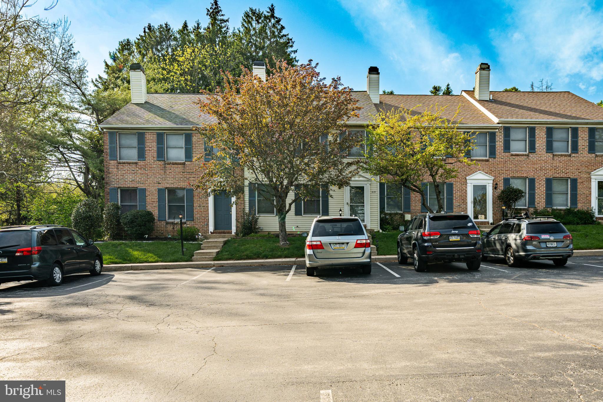 Welcome to 419 Holly Tree Court, an exceptional 3-bedroom, 2.5-bathroom townhouse located in the highly desirable Holly Tree Estates community and within the award-winning Downingtown East School District. Thoughtfully updated and meticulously maintained, this move-in ready home offers the perfect combination of comfort, functionality, and convenience.From the moment you enter, you’ll appreciate the spacious open layout designed for modern living. The well-appointed kitchen features granite countertops, ample cabinetry, and a pantry, flowing seamlessly into the expansive L-shaped family room with a cozy wood-burning fireplace. Sliding glass doors provide access to a private deck and slate patio, creating an ideal setting for outdoor entertaining or peaceful relaxation.The fully finished lower level significantly expands the living space and offers endless possibilities for a home office, fitness area, media room, or recreation space. High ceilings and a dedicated utility room add both comfort and practicality.Upstairs, the spacious primary suite features dual closets and a private en-suite bath with a walk-in shower. Two additional bedrooms, a full hall bathroom, and convenient laundry access complete the second level.Notable Features & Updates3 Bedrooms | 2.5 BathroomsFinished Basement with High CeilingsGranite Countertops & PantryWood-Burning FireplacePrivate Deck & Slate PatioRoof, HVAC & Water Heater approximately 5 years oldAmple Storage Including Attic AccessMove-In Ready ConditionPrime LocationIdeally situated just off Route 113, this home offers convenient access to major highways, shopping, dining, parks, and everyday amenities in Chester Springs and Downingtown.Don’t miss the opportunity to own this beautifully maintained home in one of the area’s most sought-after school districts. Schedule your private tour today.