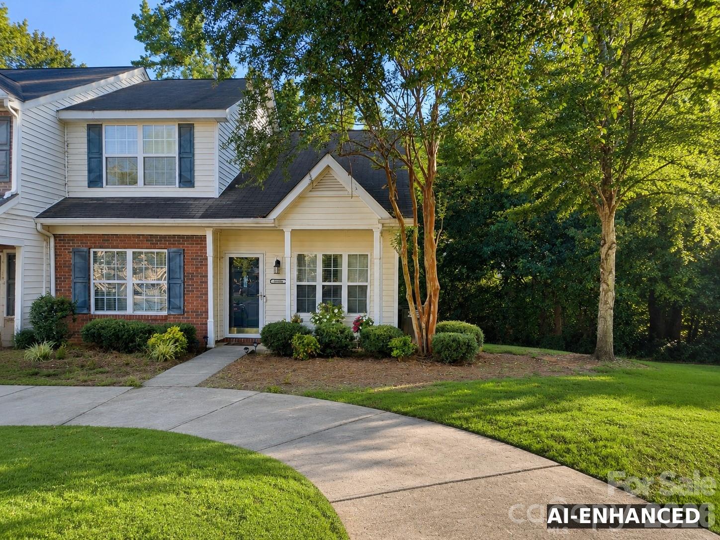 Welcome to this beautifully maintained 3 bedroom, 2.5 bath end-unit townhome, ideally situated in Charlotte’s University area. The thoughtfully designed floor plan features a private primary suite on the main level, complete with a beautifully renovated bath. Laminate wood flooring flows through the kitchen and spacious living room, where soaring vaulted ceilings and a gas fireplace create an inviting setting for both everyday living and entertaining. Two additional bedrooms provide comfortable space for guests, a home office, or hobbies. Conveniently located near major interstates, UNC Charlotte, the LYNX light rail, shopping, dining, and everyday amenities, this home offers an appealing combination of comfort, convenience, and low-maintenance living.