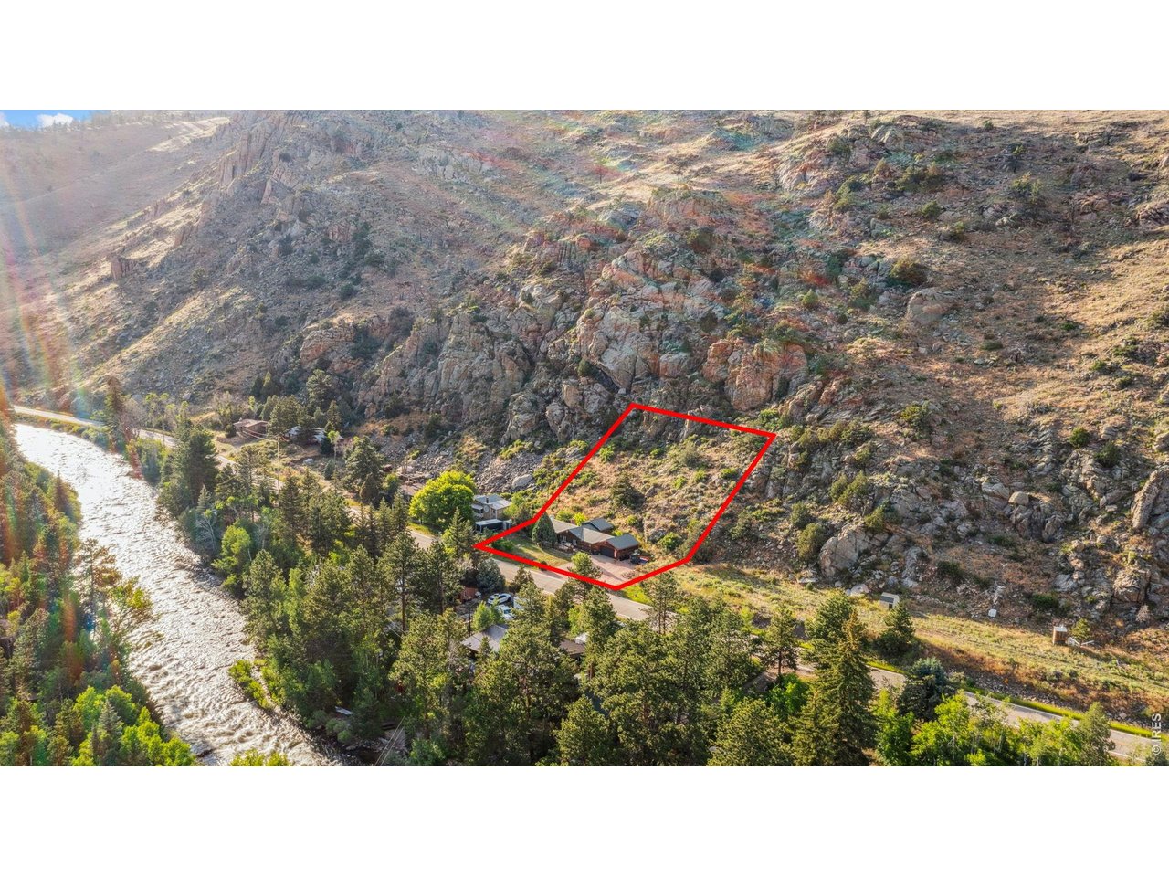 Motivated Sellers! Discover this charming ranch-style home nestled on nearly 1 acre in the scenic Poudre Canyon with a desirable south facing lot. Great for buyers because no flood insurance needed, minimal risk zone! Perfect for outdoor enthusiasts, it offers easy access to fishing, hiking, kayaking, camping, and hunting, with snowshoeing and snowmobiling in winter. The home features electric heat and a cozy wood-burning stove, ensuring warmth year-round. A finished and insulated garage provides ample storage and workspace. The new driveway, re-stoned last year, adds to the curb appeal. The well flows exceptionally well, ensuring reliable water, and the septic system is in great shape-truly a positive benefit. The home is well equipped for highspeed internet with a starlink mount and underground barried hookups. Located just 20 minutes from Red Feather Lakes, 30 minutes to Cameron Pass, 25 minutes to Mishawaka amphitheater, 45 minutes to State Forest State Park, and an hour to Walden, plus 0.7 miles from Glen Echo Resort's amenities. An outdoor paradise with easy access to nature and comfort!!