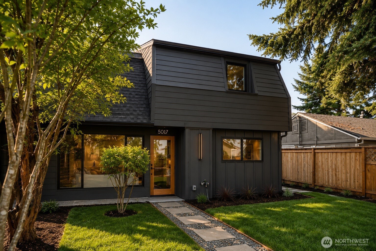 Welcome to this charming modern cottage, where thoughtful design and a unique floor plan create a home full of character. Tucked away behind a private front yard, this home offers a peaceful setting that feels removed from the city while still keeping you close to everything. The fully fenced backyard provides even more privacy with plenty of space to relax, entertain, or enjoy the outdoors. Ideally located just minutes from Tacoma Mall with easy access to I-5, shopping, dining, parks, and everyday conveniences. A truly special home offering modern style, charm, privacy, and an unexpected sense of seclusion in the heart of Tacoma.