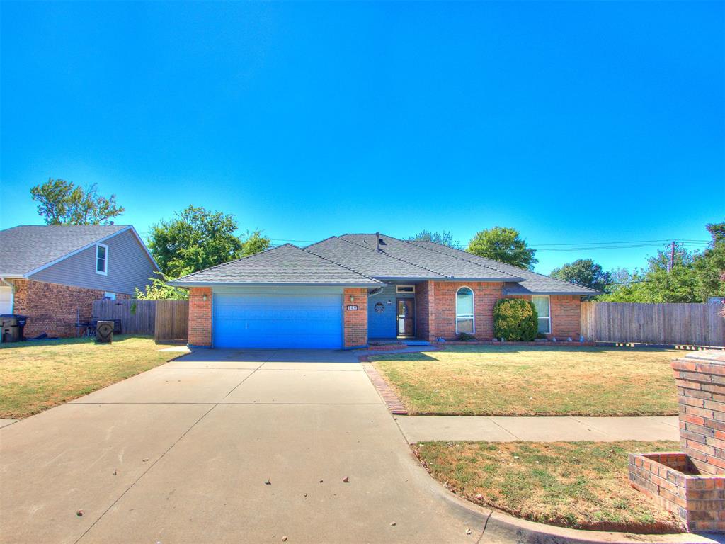 Nestled in the Ramblin Oaks community, this home is just a hop, a skip, and a jump to Moore High School as well as being within a 1 mile radius of grocery, coffee shops, and restaurants. Brick lined walkway welcomes you with flowerbeds to a roomy covered porch. Entry leads to living room featuring brick fireplace with a true hearth and wood mantle. Canned lighting, ceiling fan, built in shelving, and stained wood crown molding, trim, and baseboards are contrasted against the weathered oak colored flooring which stretches through entry, living, and primary bedroom. The tiled kitchen and dining room offer large bay style window overlooking backyard. Walk by the breakfast bar to enter the kitchen which has plenty of stained wood cabinetry and counter space galore with tile backsplash - plus built in range and oven. Primary bedroom boasts tray ceiling, sentinel style windows, and en suite bath with double walk in closets, double sinks, frosted glass shower, and  soaking tub with safety bars. Secondary bedrooms all have ceiling fans and carpeted flooring. Backyard surrounded by full privacy fence with covered patio extending out to offer an open patio area as well with in ground storm shelter with sump pump AND above ground storm shelter on the other side of the covered patio. This is a gem of a well maintained home with nostalgic accents in the wallpaper, the wood stains, and a wholesome atmosphere.