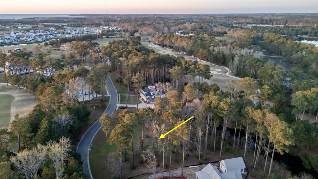 Don't miss this rare opportunity to own one of the most desirable homesites in Bay Creek's prestigious Heron Pointe Neighborhood. Perfectly positioned at the end of a cul-de-sac, backing onto a peaceful creek and framed by the golf course on both sides, this property offers an unmatched blend of beauty, located across from the Arnold Palmer's Signature Hole #3, known as one of his favorite designs on the Chesapeake Bay.  Opportunities like this are limited-especially this close to everything Bay Creek offers. Enjoy quick golf cart access to community amenities that include a 2 mile private beach, pools, 350 acre nature preserve and more!  Further, the Historic District of Cape Charles is a short distance for Restaurants, boutique shopping and marinas. Secure this premier lot now!