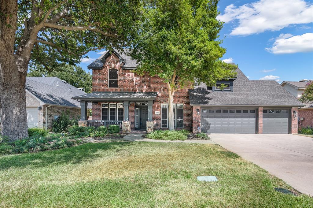 Nestled in the heart of Grapevine, this beautifully updated home offers the perfect blend of modern style, everyday comfort, & an incredible location. The completely updated kitchen is a showstopper, featuring freshly painted cabinetry, beautiful appliances, white quartz countertops. An abundance of natural light fills the spacious dining area surrounded by windows overlooking the extended flagstone patio. Updated statement lighting in the kitchen, & formal dining room adds a stylish finishing touch. The living room is equally impressive, anchored by a soaring fireplace with beautiful Limewash & Roman Clay finishes. A wall of windows brings the outdoors in while showcasing views of the lushly landscaped backyard. Retreat to the oversized primary suite with a beautifully updated bath featuring quartz countertops, gorgeous tile, & luxurious finishes. The large walk-in closet is outfitted with a custom closet system to keep everything organized. Secondary baths have been tastefully updated as well, giving the entire home a fresh, cohesive feel. The expanded laundry & mudroom is a dream! Beautiful as well as functional, with custom cabinetry, gorgeous tile, & abundant storage to help keep everyday life effortlessly organized. Fresh paint inside and out gives the home a crisp, updated feel, while stylish & durable Oak Pergola laminate flooring, complemented by tall baseboards, flows throughout most of the home on both levels. Every bedroom features a walk-in closet, including an extra-large extended closet in the second bedroom for even more storage. Add in a 3-car garage, water softener, & a reverse-osmosis system add this home checks all the boxes. The location truly sets this property apart! Enjoy being just minutes from Lake Grapevine, scenic hiking & biking trails, a community park & playground & endless opportunities to enjoy the outdoors, while having the convenience of living in the heart of Grapevine. This is Grapevine living at its best!