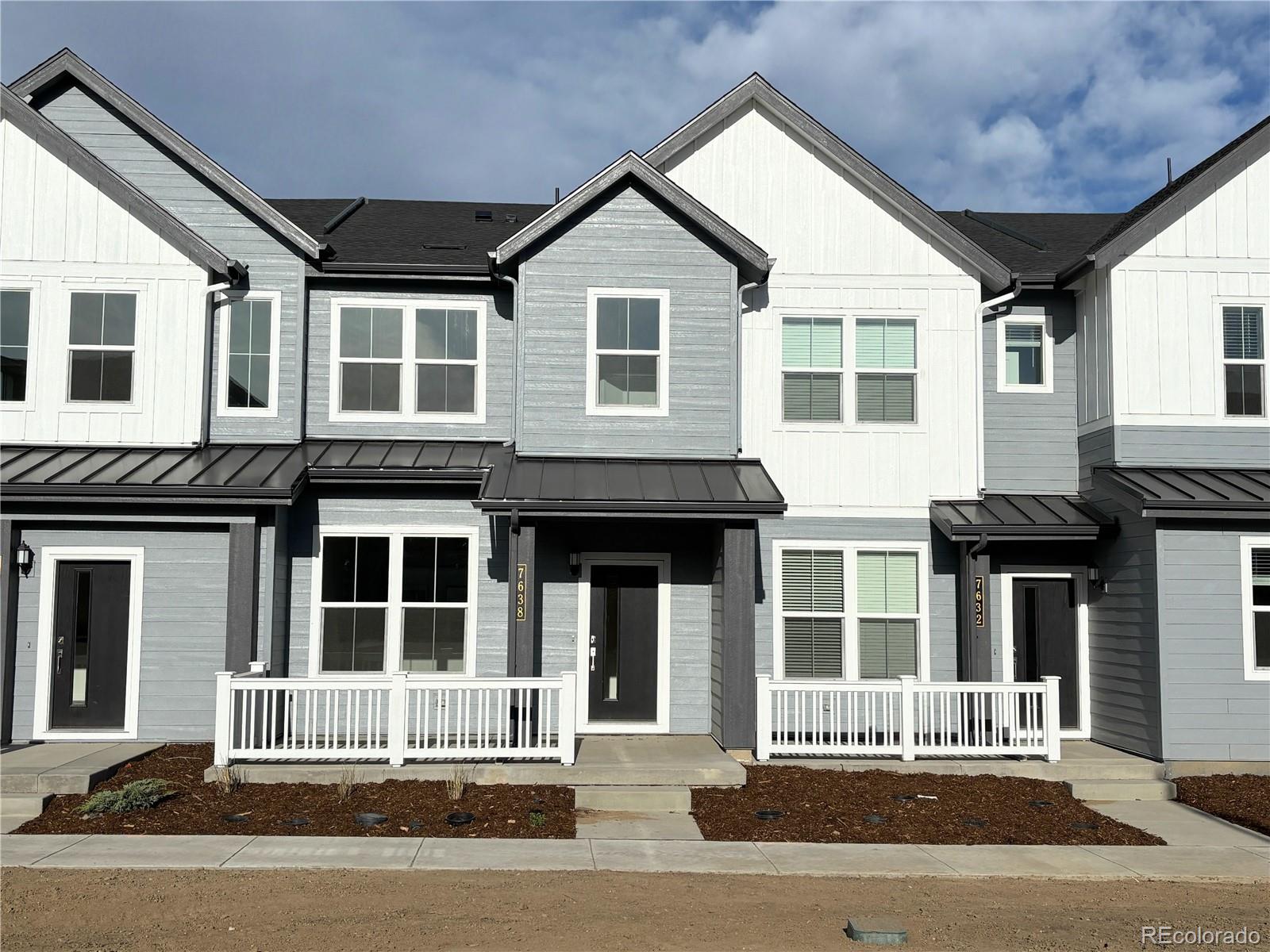 **Contact builder today about Special Financing for this home - terms and conditions apply**Available NOW!Low maintenance living in the gorgeous new Vermilion community. Just lock up and go. This brand new 2-story townhome in a 4-plex features 2 bedrooms, 2.5 baths, great room, kitchen, upper laundry, loft,  2 car attached garage (rear alley entry) and conditioned crawl space. Gorgeous finishes and upgrades throughout including, slab quartz counters, luxury vinyl plank flooring, stainless steel appliances and more. The builder provides the latest in energy efficiency and state of the art technology with several fabulous floorplans to choose from. Energy efficiency, and technology/connectivity seamlessly blended with luxury to make your new house a home.  Association fee subject to change. Washer, dryer and whole house blinds included with this home.  Photos and the Matterport 3D tour are of a model home and are provided for illustrative purposes only. Features, finishes, and layout may vary and are subject to change. Front porch adjacent to open green area.