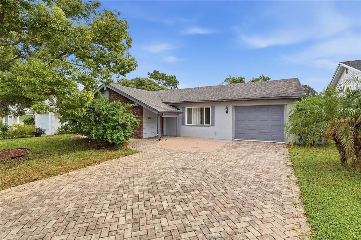 Water access, low HOA, and a floor plan that works. 3 bedrooms, 2 baths, open living space, solid surface counters and flooring, and approximately 1,350 square feet of measured living area, more than public records show. Community water access makes the kayak an everyday thing instead of a weekend project. Fully remediated and insurable sinkhole home