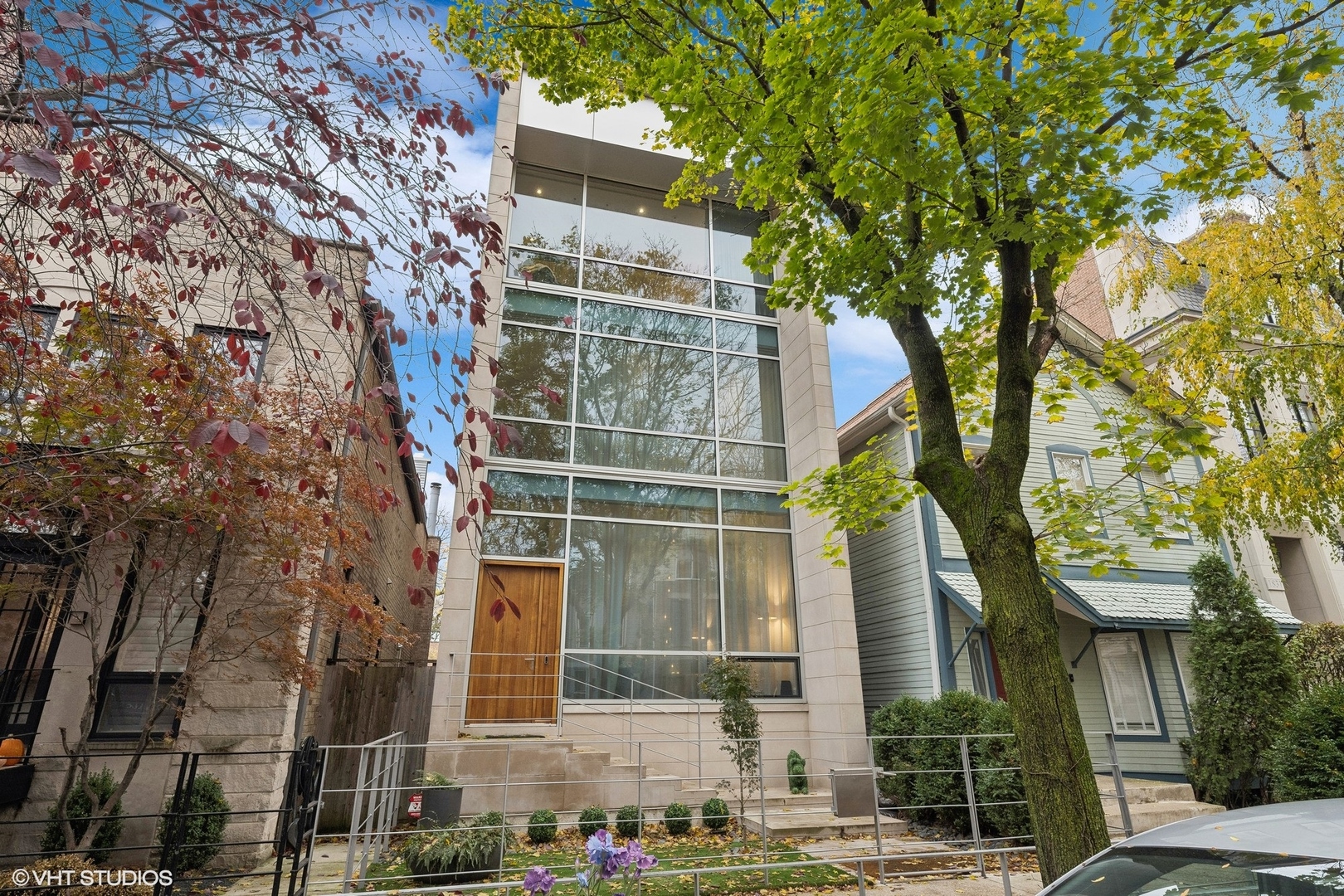 Located in the heart of Lincoln Park on one of Chicago's most coveted tree-lined blocks, 1837 N Fremont is a custom-crafted single family home originally constructed by Chicago's boutique luxury home builder, Crescent Rock Builders and designed by Studio Dwell. In its recent, full main floor renovation led by awarded Chicago designer Donna Mondi, walls were removed, floors redone, a new fireplace installed, artisan-crafted wallpapers were applied, and more. The kitchen also underwent a full rehaul with no detail spared - new Miele appliances, custom quartz, hand-polished lacquer cabinetry abound. The top-of-the-line kitchen leads to an expansive family room, complete with a NanaWall glass door system which opens the space entirely to welcome the rear terrace for impeccable indoor/outdoor living. As you enter the home, the multi-level living room meets the stair atrium, exemplifying the home's open aesthetic. The rarely-found, two-story front window allows for an abundance of natural light throughout the home. Wide plank walnut flooring and ultra high-end finishes span each level. The second floor offers 3 bedrooms, a full bath and laundry room, followed by a serene primary suite located on the home's third level. The primary suite features a dressing room, walk-in closet, private green roof terrace, and luxurious bathroom complete with steam shower and a Miele stainless stackable washer/dryer. Up to the top floor is the home's rooftop, boasting absolutely stunning views of the city. The rooftop terrace is fully equipped with a custom, stainless steel outdoor chef's kitchen including a dumbwaiter that travels down to the home's main kitchen--the definition of rooftop entertaining with ease. The modern residence's lowest level houses a media room, lounge, full guest suite, and a climate controlled wine cellar following a stone garden. Furthermore, 1837 N Fremont features whole-home automation by Savant System, hydronic solar panels, hydronic heated floors on all levels, and a radiant-floor heated two-car garage that has its own, additional roof deck. This stunning home in an unbeatable location--only one block from Armitage with endless shopping and dining options--is unmatched when it comes to complete sophistication and modern comforts.