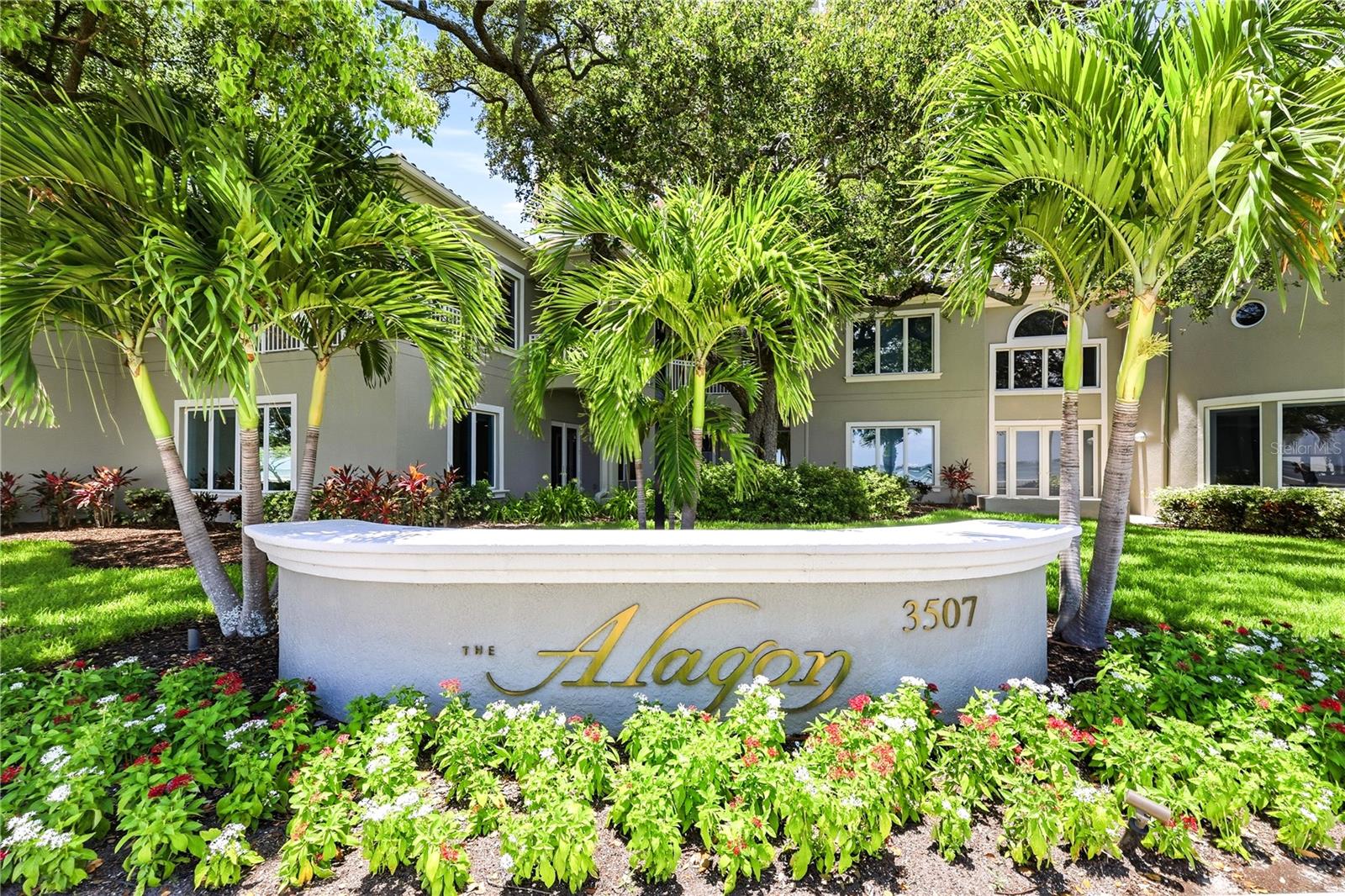 PRIVATE ENTRANCE 5 BEDROOM TOWNHOME WTH CONDO AMENITIES ON BAYSHORE BLVD. Exceptional opportunity awaits at The Alagon. This is your opportunity to own one of only 3 "City Home" TOWNHOMES ON BAYSHORE BLVD.NOTHING ELSE compares to the privacy and comfort of a luxury townhome with 2 CAR GARAGE and the unparalleled amenities and services of one of Tampa’s premier waterfront residences.Beautifully updated and impeccably appointed, this extraordinary five-bedroom, five and a half-bath residence is the epitome of timeless elegance and sophisticated design. Every detail has been thoughtfully curated, from the grand staircase and designer lighting to the exquisite finishes found throughout. Bonus to have a full en-suite bedroom downstairs for guests or multi generational living. Upstairs primary includes a sitting area, a separate office or nursery, spectacular primary spa bath with floating tub and walk-in shower, extra large walk-in closet with additional built-in storage and Bayshore views from every angle. Covered balcony makes this the perfect place to enjoy morning coffee.Designed for both the passionate chef and the consummate host, the spectacular gourmet kitchen serves as the heart of the home, offering exceptional craftsmanship, premium appliances to include Wolf induction cooktop, DUAL SUB-ZERO REFRIGERATOR WITH BEVERAGE DRAWERS, DOUBLE WOLF OVENS, wine refrigerator, ice maker, and generous open floorplan for entertaining on any scale. One touch controls for lighting, electric shades, whole house entertainment. Electric fireplace sets the perfect backdrop for sophisticated entertaining.French doors and breathtaking views enhance nearly every room, filling the home with abundant natural light while creating a seamless connection to the beauty of Bayshore Boulevard. Expansive living spaces provide an effortless blend of refinement and comfort.Enjoy the rare advantage of a detached residence complete with a private two-car garage, while indulging in the full-service lifestyle and exceptional amenities offered by The Alagon. This is a 24 hour concierge building for added security and privacy. Gym, pool, card/game room in condo tower and furnished guest suites. Truly one-of-a-kind opportunity to experience luxury living at its finest—exceptional in every way.