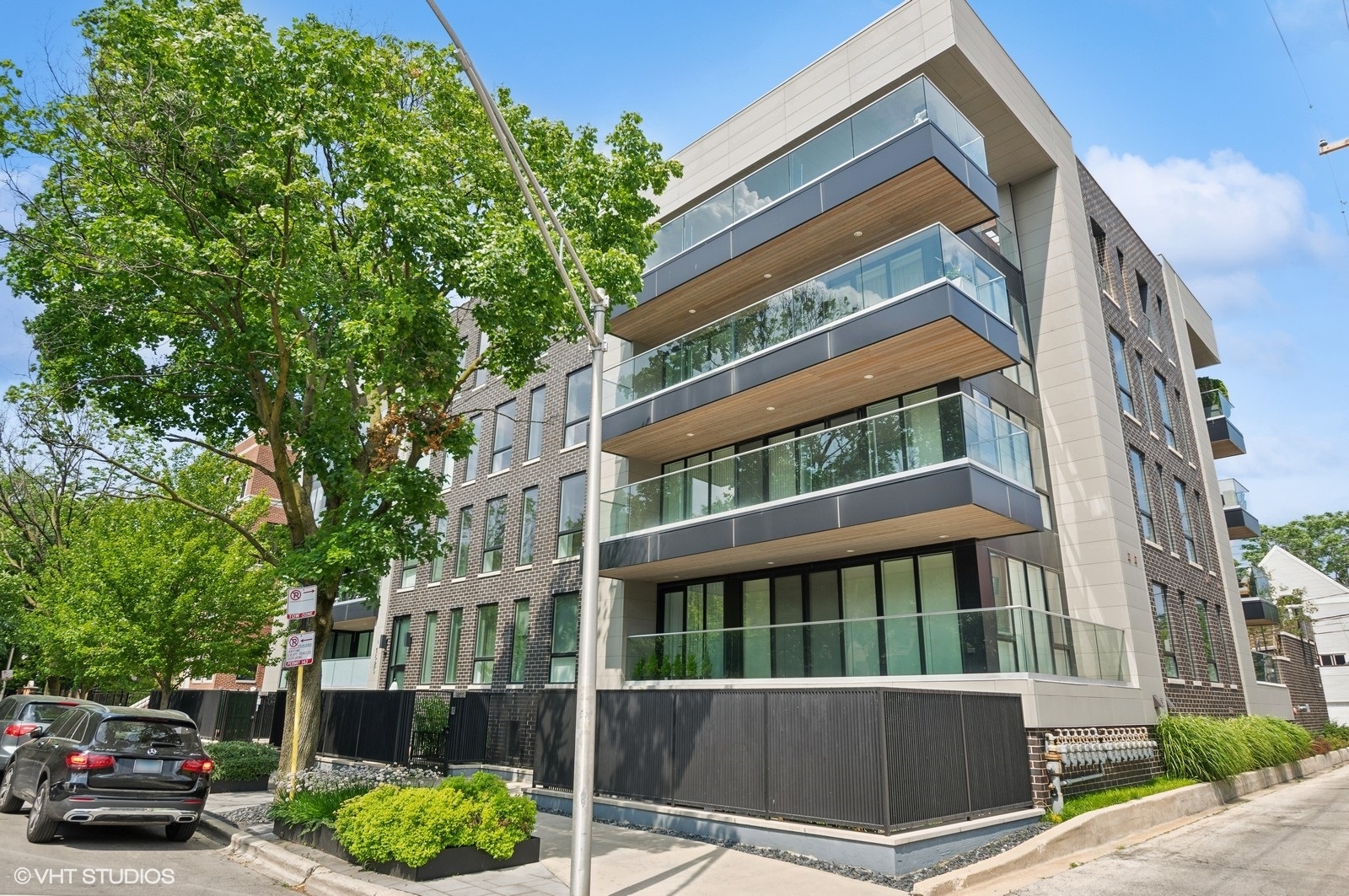 One of a kind light-filled Lincoln Park duplex penthouse. Private elevator entrance brings you to this top floor hidden gem featuring 6 bedrooms, 6 bathrooms and 3 outdoor spaces including an expansive 1200 square foot deck with magnificent City & Sunset views. This boutique building in the most exclusive section of Lincoln Park is minutes from everything you'd want in Chicago, designed by Pappageorge Haymes with Catherine Andrews custom interiors. Light abounds in this home, and the primary interior space flows naturally through floor to ceiling retractable doors, creating an expansive indoor/outdoor oasis where multiple seating areas and abundant space allow you to create the perfect outdoor urban refuge. The chef's kitchen is equipped with a Wolf 6-burner range + griddle, Sub-zero family size refrigerator, 2 wine coolers & the Miele trifecta of speed oven, coffee machine and dishwasher. It's perfect for either entertaining or for functional everyday living. The main floor showcases a 36 foot gallery hallway leading to a true sanctuary of a primary bedroom, featuring custom cabinetry and a private balcony secluded in the treetops. The spa quality bathroom includes a distinctive soaking tub, walk-in steam shower and a robust walk-in closet featuring a central island, dressing benches, a handbag wall, dedicated shoe system, and abundant storage. An additional ensuite bedroom is also on this floor. The lower level (3rd Floor) features an oversized family/media room with custom white oak cabinetry, Maya Romanoff wallcoverings and features its own balcony nestled over the quiet dead end street. This level also includes four generously sized bedrooms and 2.5 bathrooms. The bedrooms are arranged so that walls could easily be opened to accommodate an expansive library, home gym, or a virtual corporate office. Both floors feature their own dedicated laundry rooms & separate HVAC systems for maximum comfort. The home is also complete with a Savant whole home smart system allowing for control of the custom automated window shades as well as music & televisions. Private two car garage with easy in-out access. Just steps from top restaurants (Alinea), top theater (Steppenwolf), and top shopping (North Clybourn or Armitage districts). Daily living is made easy with this prime location which is walking distance to the city's largest Whole Foods, train, and the lakefront. THIS is the reason Lincoln Park remains the city's most sought after neighborhood.