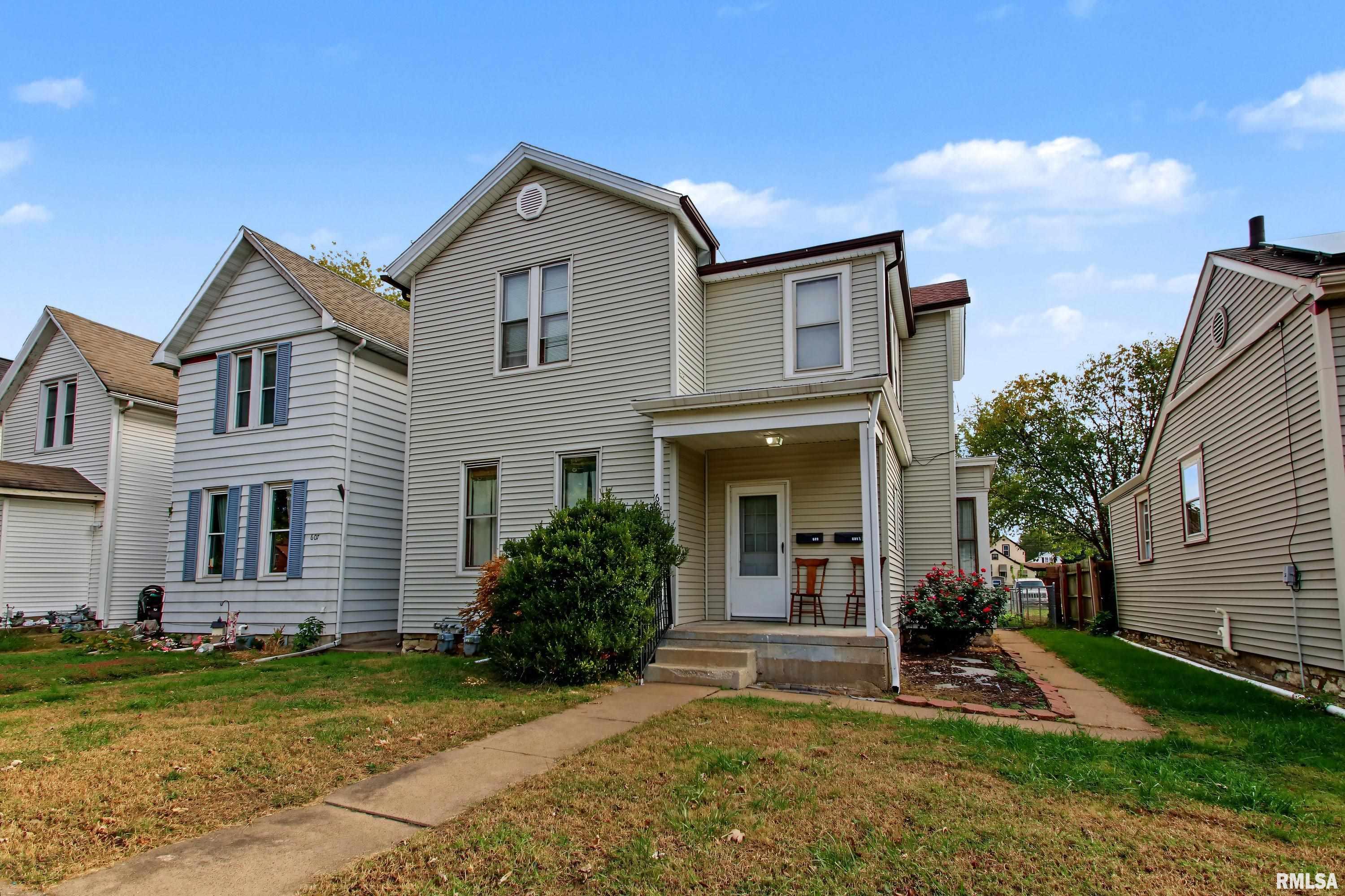 Great income-producing opportunity at 609 South 14th Street! Located on Quincy's south side, this well-maintained duplex offers strong rental potential with over $20,000 in improvements completed by the seller within the past year! The property features two separate units, with a 1-bedroom, 1-bathroom lower unit and a 2-bedroom, 1-bathroom upper unit, both currently rented on month-to-month leases. Both units have undergone extensive renovations within the past year, including fresh paint, new luxury vinyl plank flooring, and interior doors. The upstairs unit features even more recent improvements all done within the past year, including a furnace, water heater, and kitchen cabinets. Each unit comes equipped with newer appliances, and the seller-owned washer and dryer in the lower unit will convey with the property. Tenants are responsible for gas and electric, while water is included in the rent. Outside, you'll find a fully fenced backyard with convenient alley access, a dedicated parking slab, and additional off-street parking. Previously used as a single-family residence, this property also offers the potential to be converted back for owner-occupancy or multigenerational living. Whether you're looking to expand your investment portfolio or explore future living arrangements, this versatile property has plenty to offer! Schedule your showing today! Minimum 24-hour notice required for all showings.