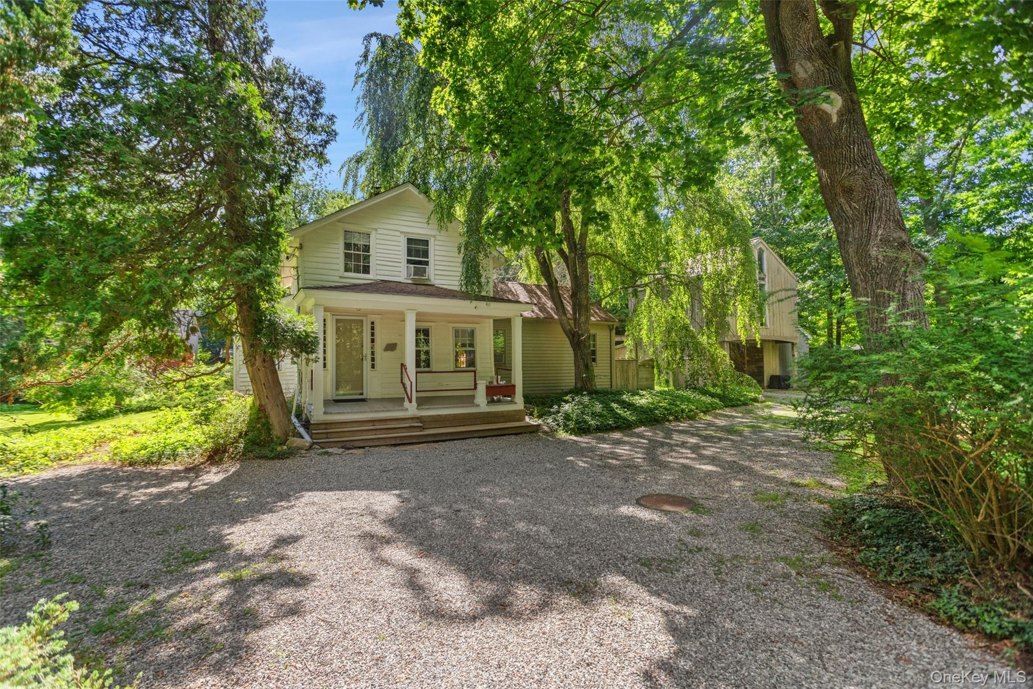 STEP INTO THE PAST. Part of South Salem’s rich history. Charming Antique Farmhouse, circa 1775, once a general store and post office. Rocking Chair Porch. Original Front Parlor. Country Kitchen. Warm and inviting Living Room with vaulted ceiling and doors to rear deck. Two Bedrooms and Two Baths. Separate Barn with garage bay and second floor heated Studio with vaulted ceiling. Picture book one-acre setting with old stone walls and mature trees. Conveniently situated with easy access to the shops and restaurants of Ridgefield and New Canaan, the Metro-North train and commuting arteries.