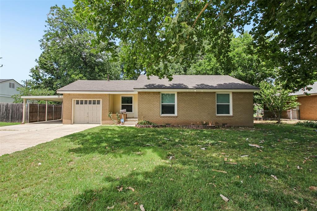 Welcome home, just 1.2 miles from The University of Oklahoma. Boomer sooner!Makes you think you just found "the one"? Us too. This cutie has a brand new roof. Outside, there is an extended concrete driveway for all the cars during game day. Carport off the side of the one car garage that leads to a gate through the backyard. Large shade trees. Inside you will find warm toned updated wood look flooring, grey walls, and updated light fixtures. Gas oven in the kitchen alongside blue statement cabinetry. The listing team's favorite part about Westlawn is each room has several windows. Bright and airy! Backyard is big for the doggos, the cook outs, and of course the jumping up and down when Oklahoma football is crushing it. Storage shed, too. I told you, this is "the one"!!