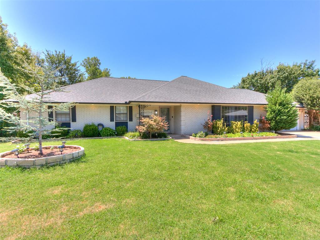 Beautiful ranch-style home in Oklahoma City, ideally located near shopping, dining, and entertainment. Situated on a quiet cul-de-sac and backing to the neighborhood park, this home offers a spacious 0.39+acre lot and plenty of room to enjoy both indoors and out. Step inside to an inviting oversized living room featuring beautiful wood floors, a large picture window that fills the space with natural light, and a full wall of built-in bookshelves and cabinetry. The living area flows into the dining space, complete with a built-in storage nook and breakfast bar overlooking the kitchen. The kitchen offers abundant cabinetry, generous counter space, and built-in stainless steel appliances. The primary suite features plantation shutters, a spacious closet, and a private en-suite bathroom. Outside, enjoy a sprawling backyard surrounded by mature trees with direct views of the neighborhood park.