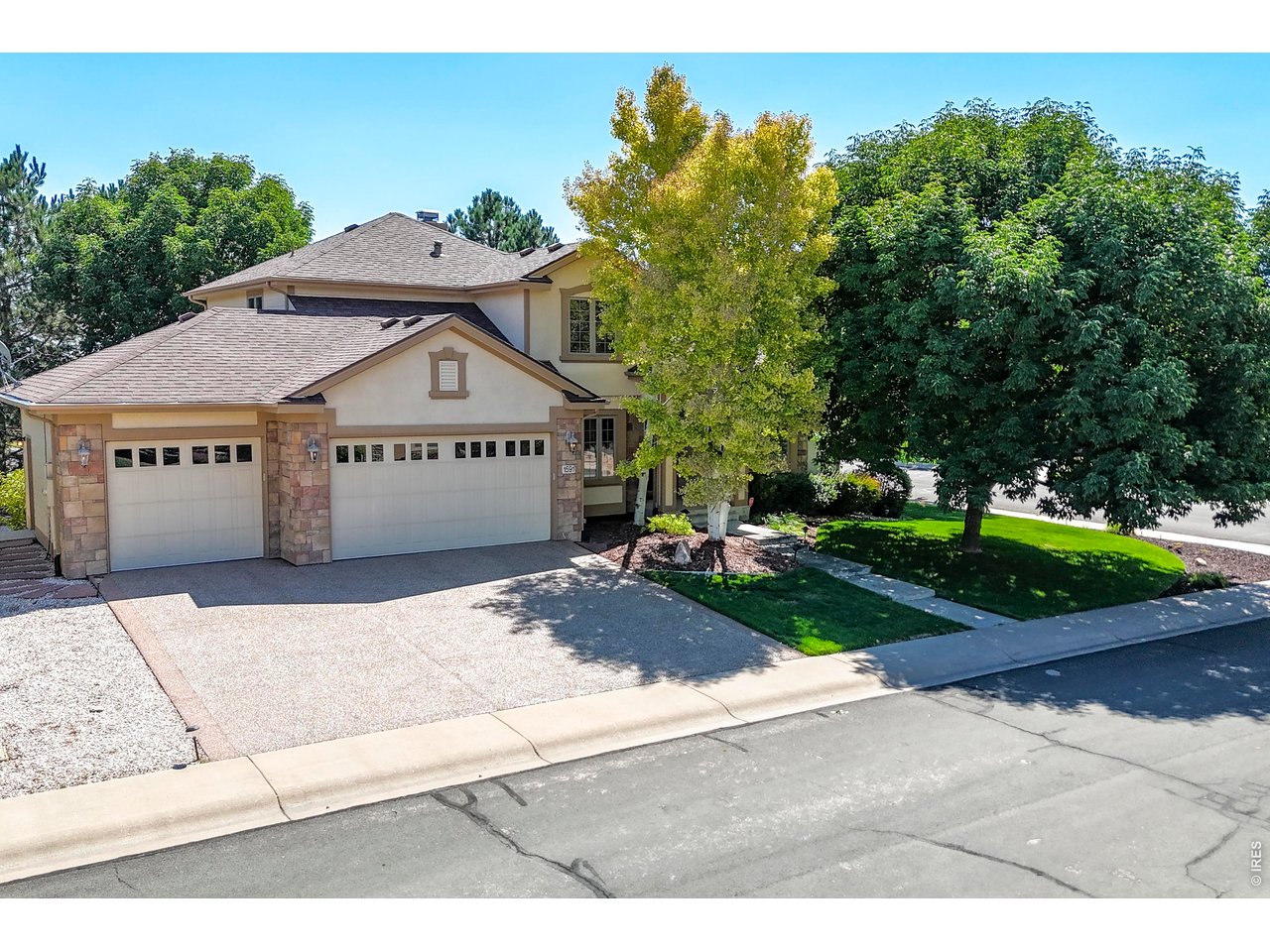 Beautifully maintained. Thoughtfully improved. And built with details you don't see every day. This former model home offers true main floor living with the primary suite and 5-piece bath, office/flex space, laundry, and everyday living all on one level. Hickory hardwood floors, 9-foot ceilings, crown molding, and a double-sided fireplace give the home warmth and character, while the condition reflects how carefully the home and property have been maintained. Recent improvements include NEW sound reducing laminated windows and a NEW HVAC system. An oversized 3 car garage provides plenty of room for vehicles, bikes, gear and storage while the unfinished basement gives ample storage today with plenty of room to finish later. With 4,602 total square feet, this home delivers exceptional space and flexibility at this price point. Set on a premium corner lot with mature landscaping, this home offers something increasingly hard to find in Windsor; an established, peaceful neighborhood with a park, low HOA and no metro district. Close to downtown Windsor, I-25, shopping, dining and everyday conveniences. A 2.375% assumable VA loan is also available to qualified buyers with entitlement. Well built. Beautifully cared for. Ready for its next chapter.