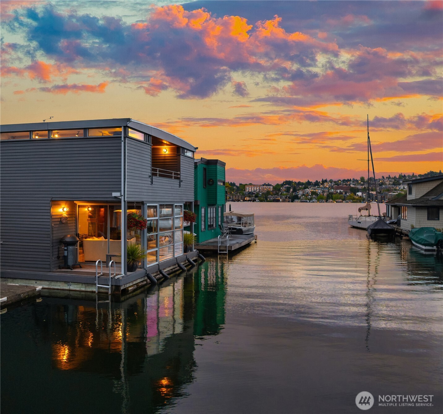 Designed by George Suyama, one of the PNW’s most revered architects & brought to life by the acclaimed firm Krekow Jennings, this is one of Seattle’s most distinctive floating homes—a rare harmony of design & craftsmanship. Its sun-filled, south-facing slip near the end of Westlake’s premier dock offers views of Downtown & Gas Works Park. Gracefully extended into the channel, the glass-wrapped sunroom creates a unique view corridor into Lake Union, blurring the boundaries between indoors & out. A flat roof with ladder access offers 360* views & exciting potential for a full rooftop deck. Quintessential Seattle living awaits—just a short stroll from both Downtown & Fremont. Gated entry, ~45’ x 8.5’ boat moorage & city parking for residents.